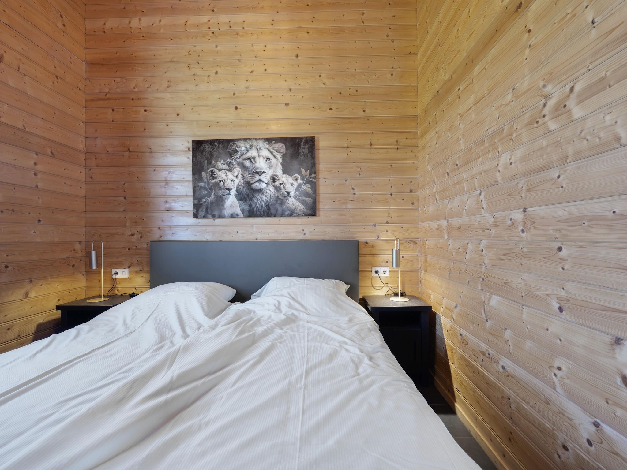 Een slaapkamer van Vakantiehuisje 20 in Someren-Heide