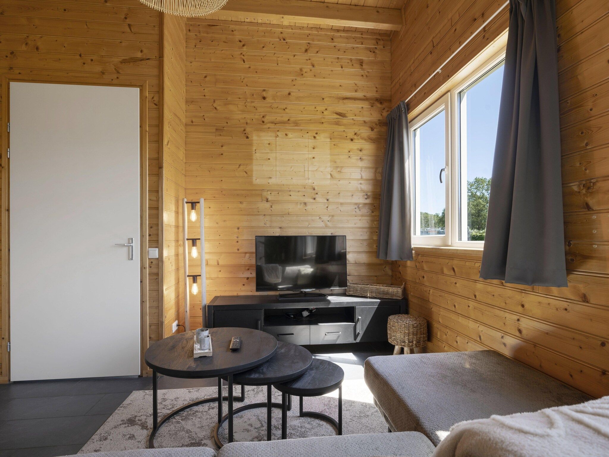 De woonkamer van Vakantiehuisje 20 in Someren-Heide