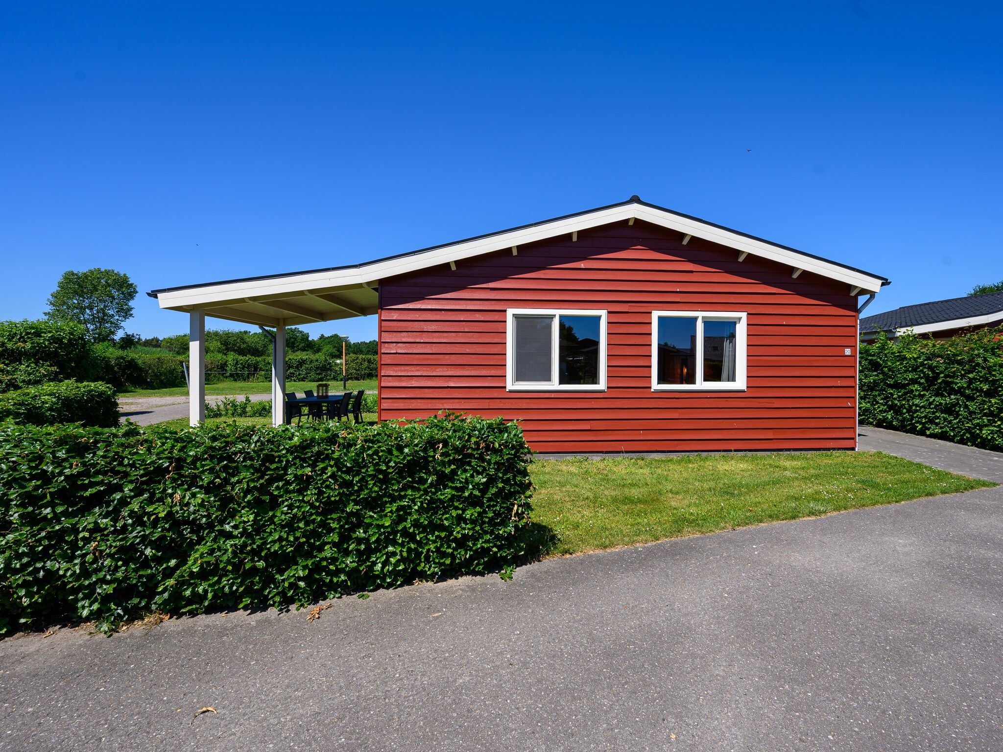 De buitenkant van Vakantiehuisje 20 in Someren-Heide