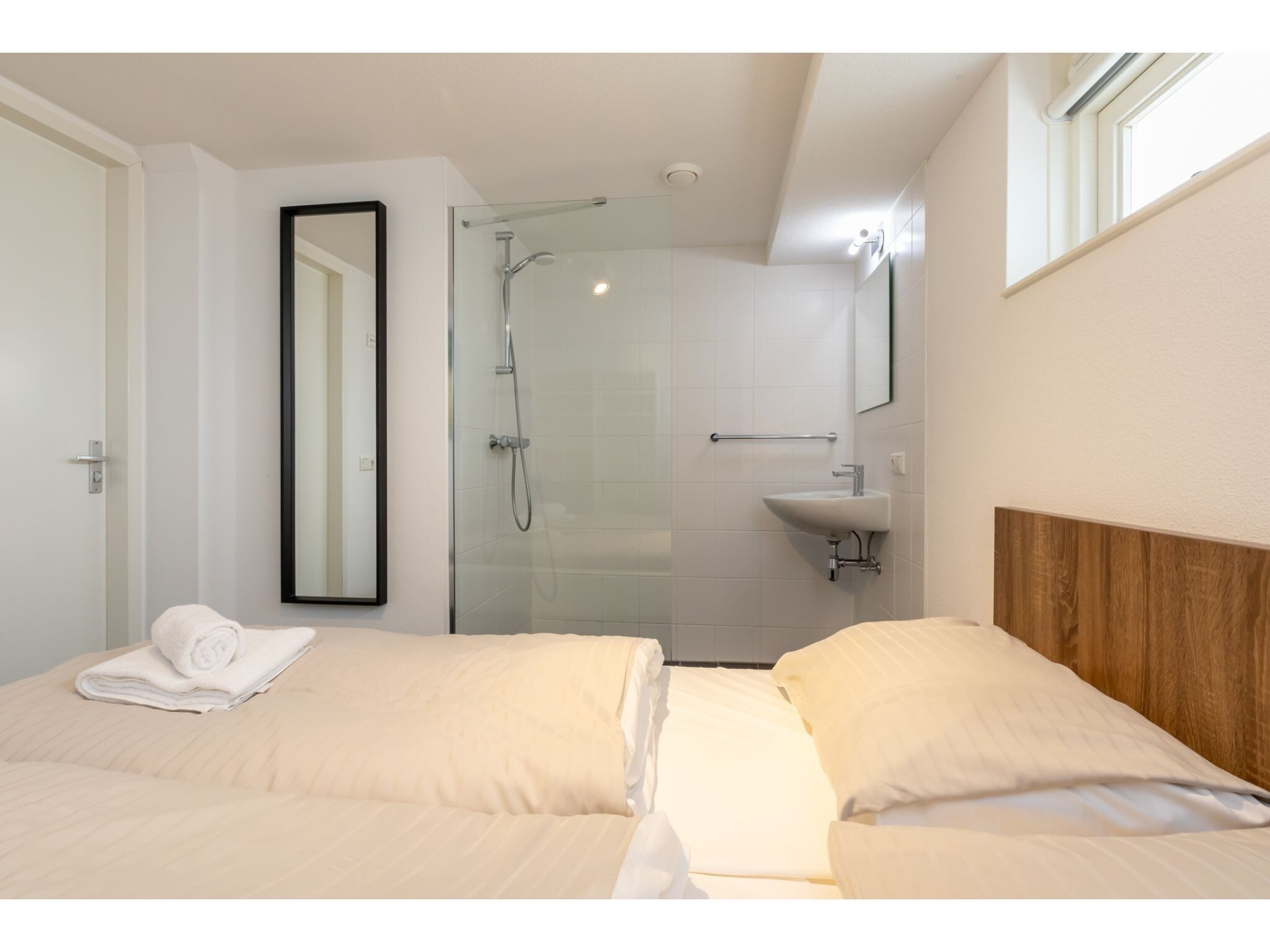 Een slaapkamer van Strandvilla 30 in Renesse