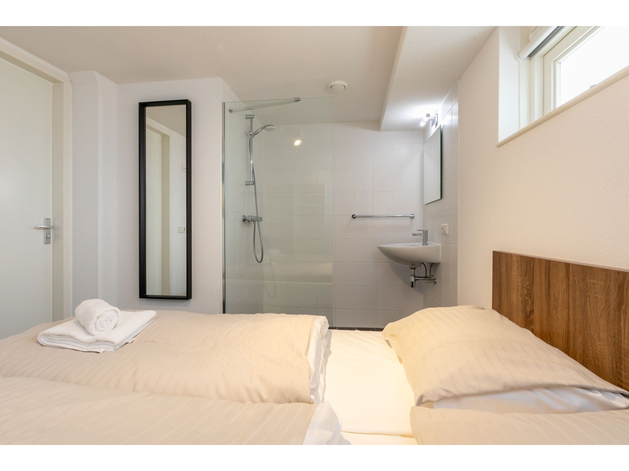 Een slaapkamer van Strandvilla 31 in Renesse