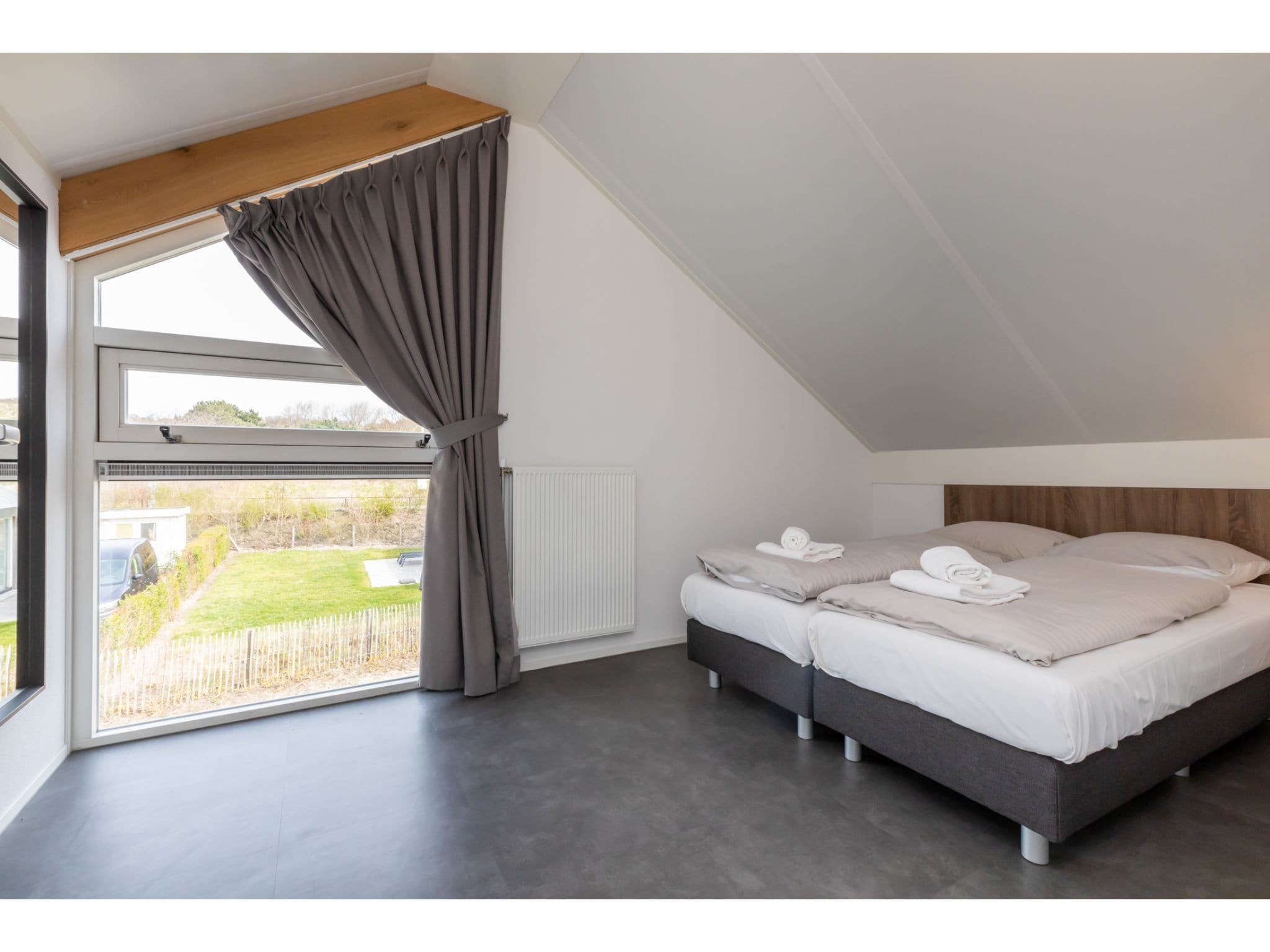 Een slaapkamer van Strandvilla 31 in Renesse