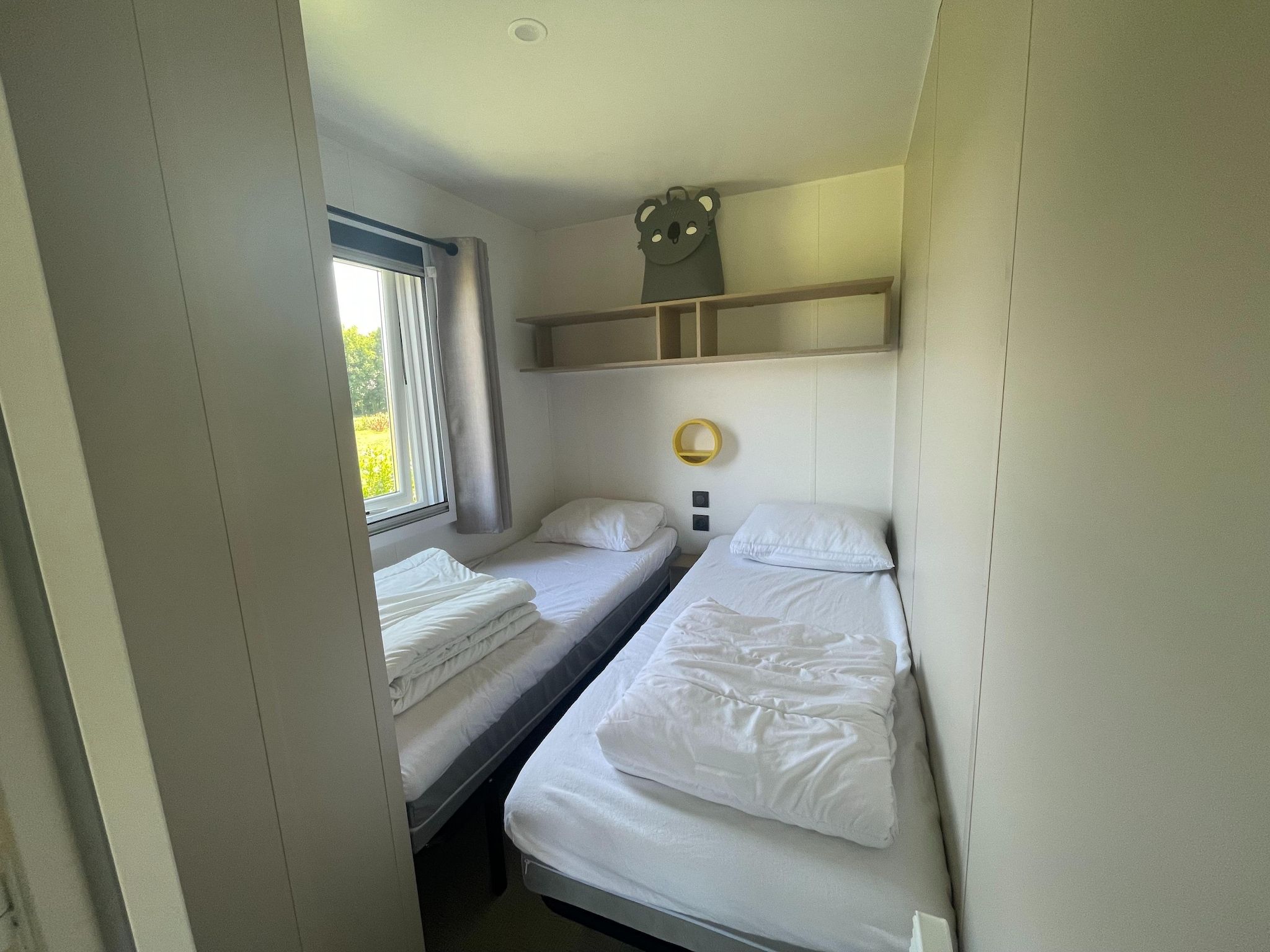 Een slaapkamer van Elperhof Veldlodge in Schoonloo