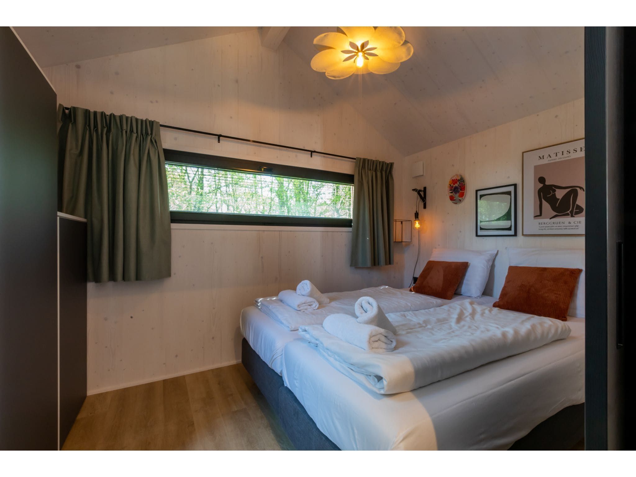 Een slaapkamer van Tinyhouse La Mouette in Zoutelande