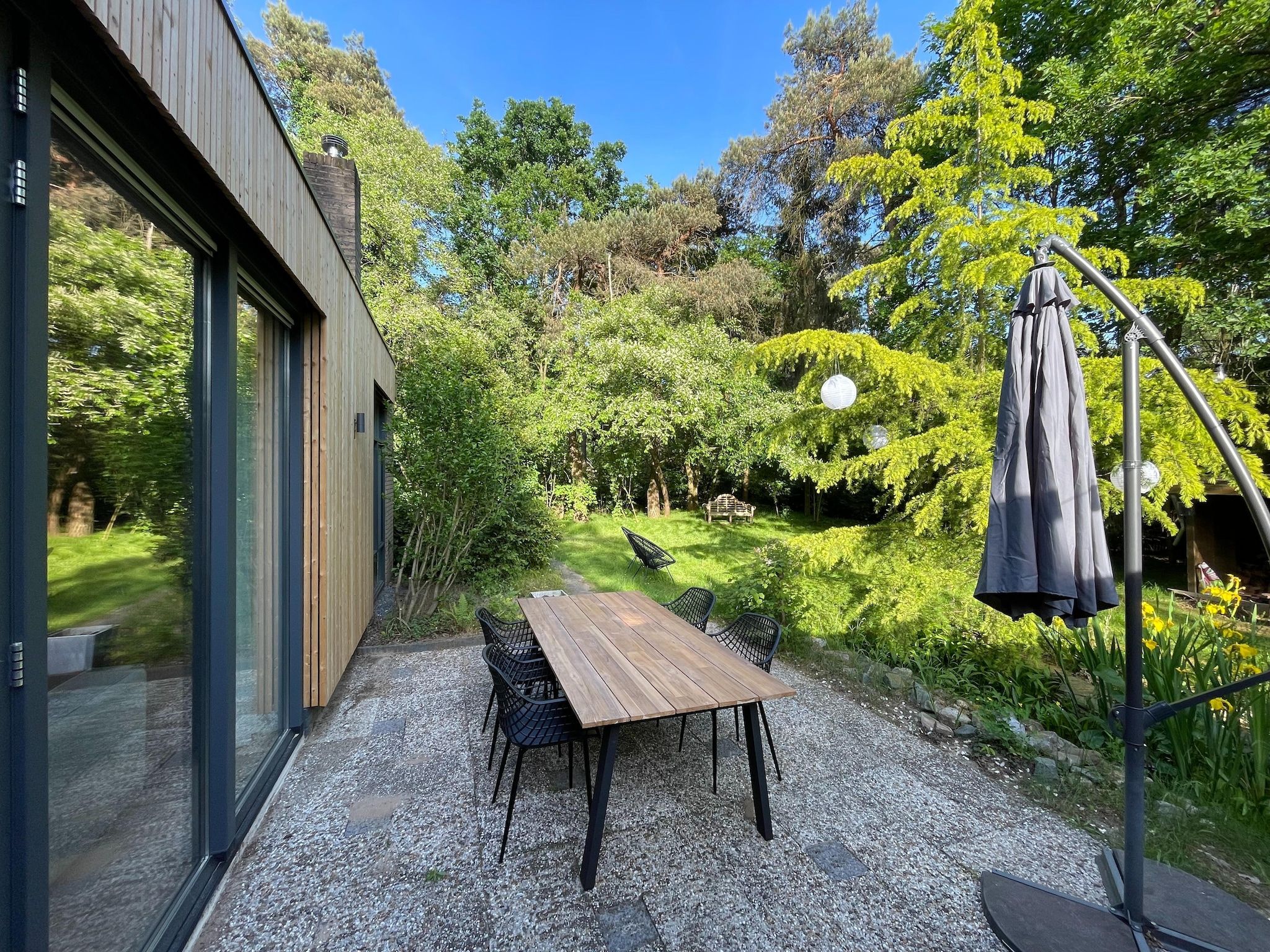 De tuin van Bos suite in Zelhem