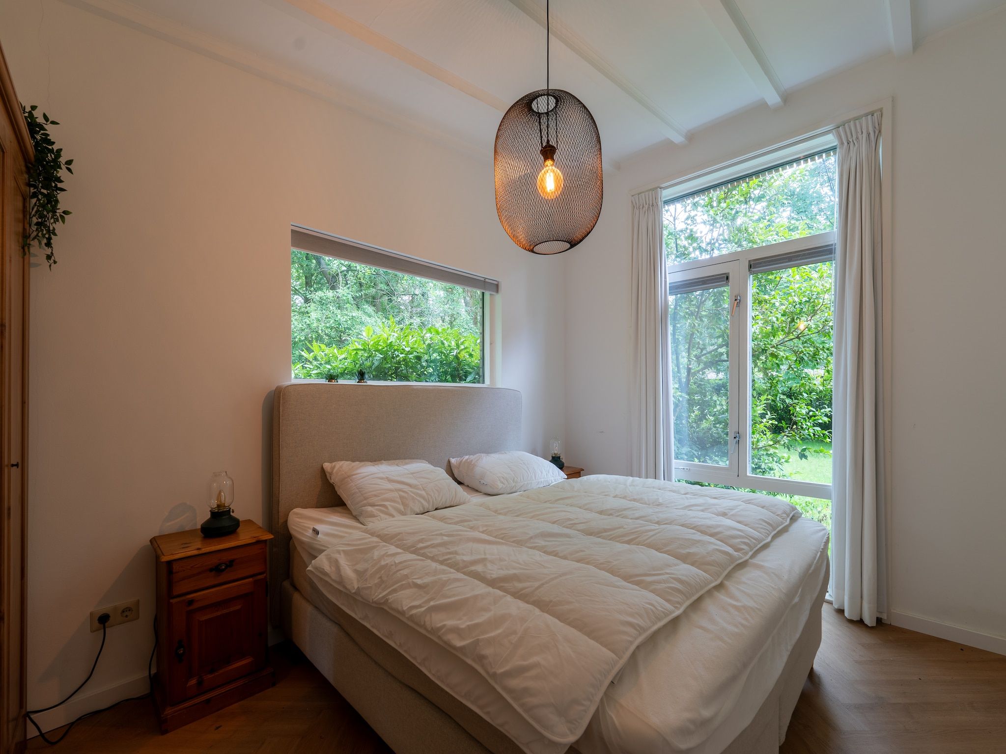 Een slaapkamer van Bos suite in Zelhem