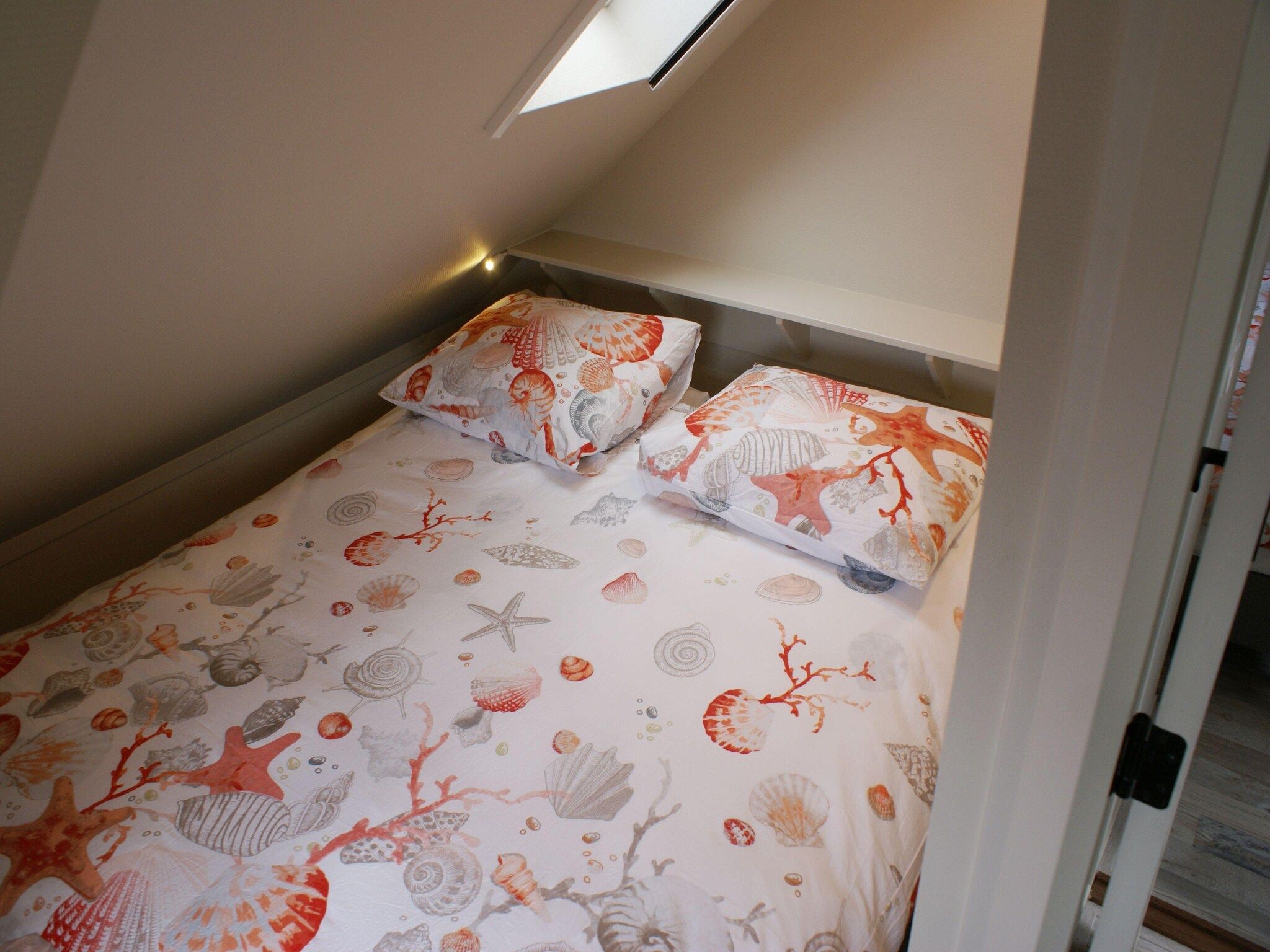 Een slaapkamer van Wad'n Leven en Geluk in Paesens
