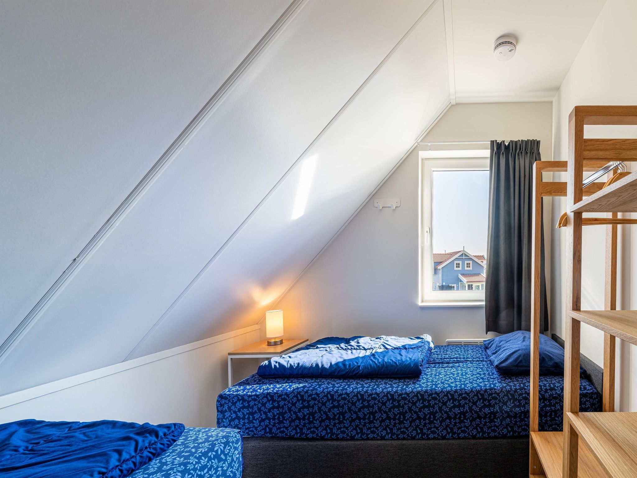 Een slaapkamer van Kuifduiker 138c in Simonshaven