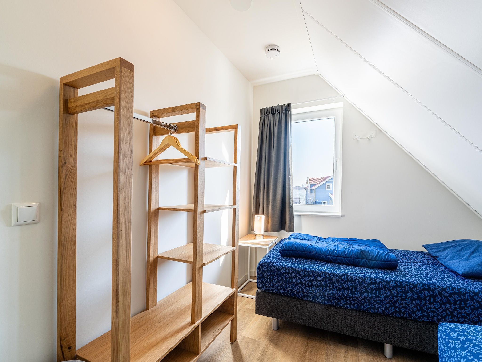 Een slaapkamer van Kuifduiker 138c in Simonshaven