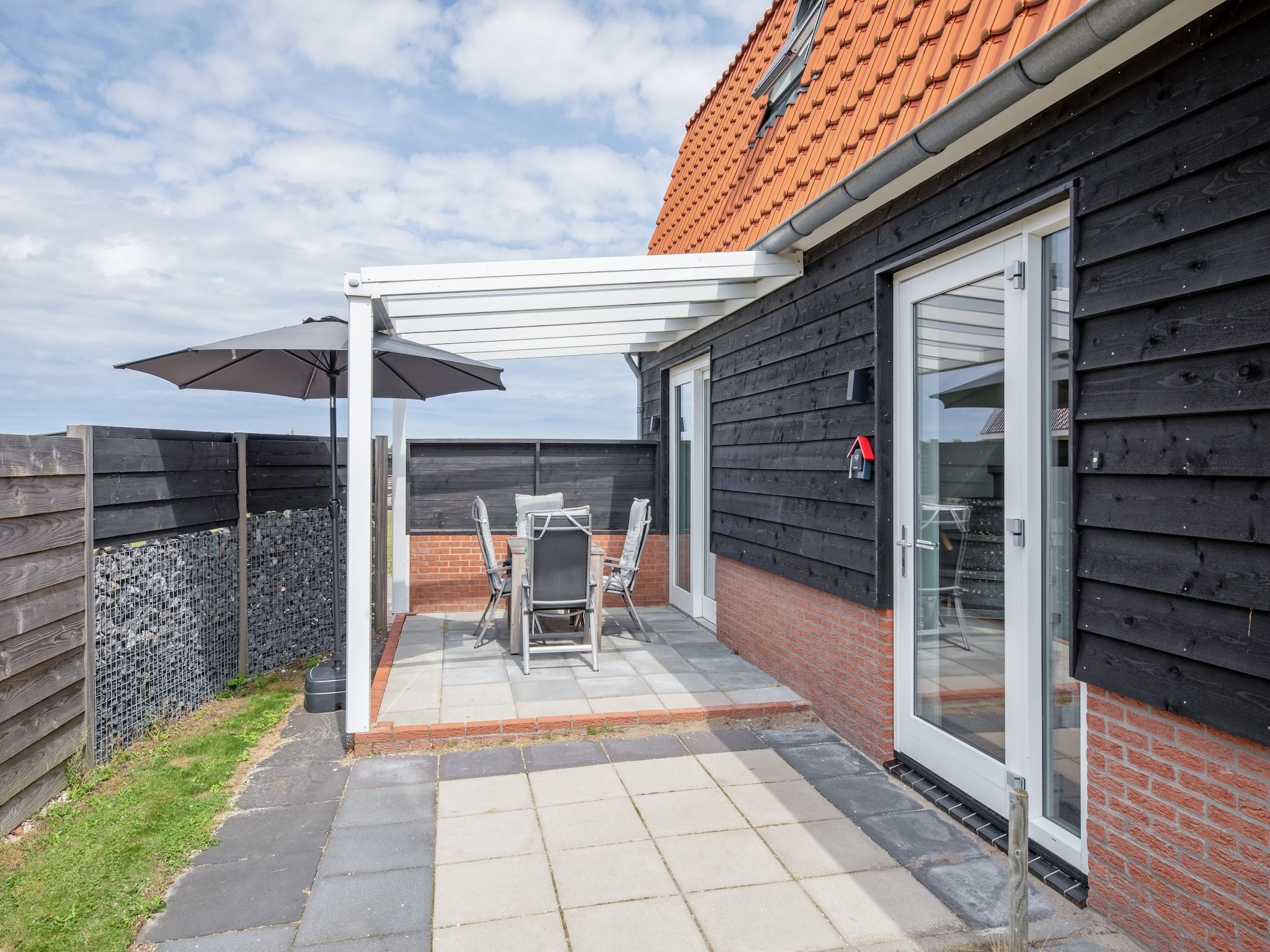 Het terras van Wulpenweid 10 in Den Burg
