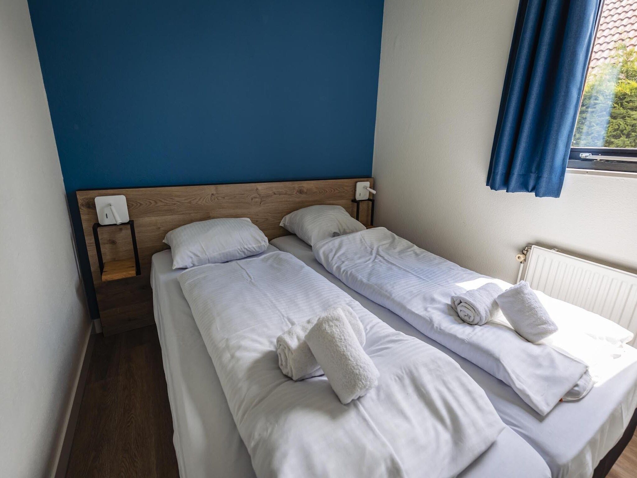 Een slaapkamer van Vakantiepark 't Broeckhuys 8 in Ewijk