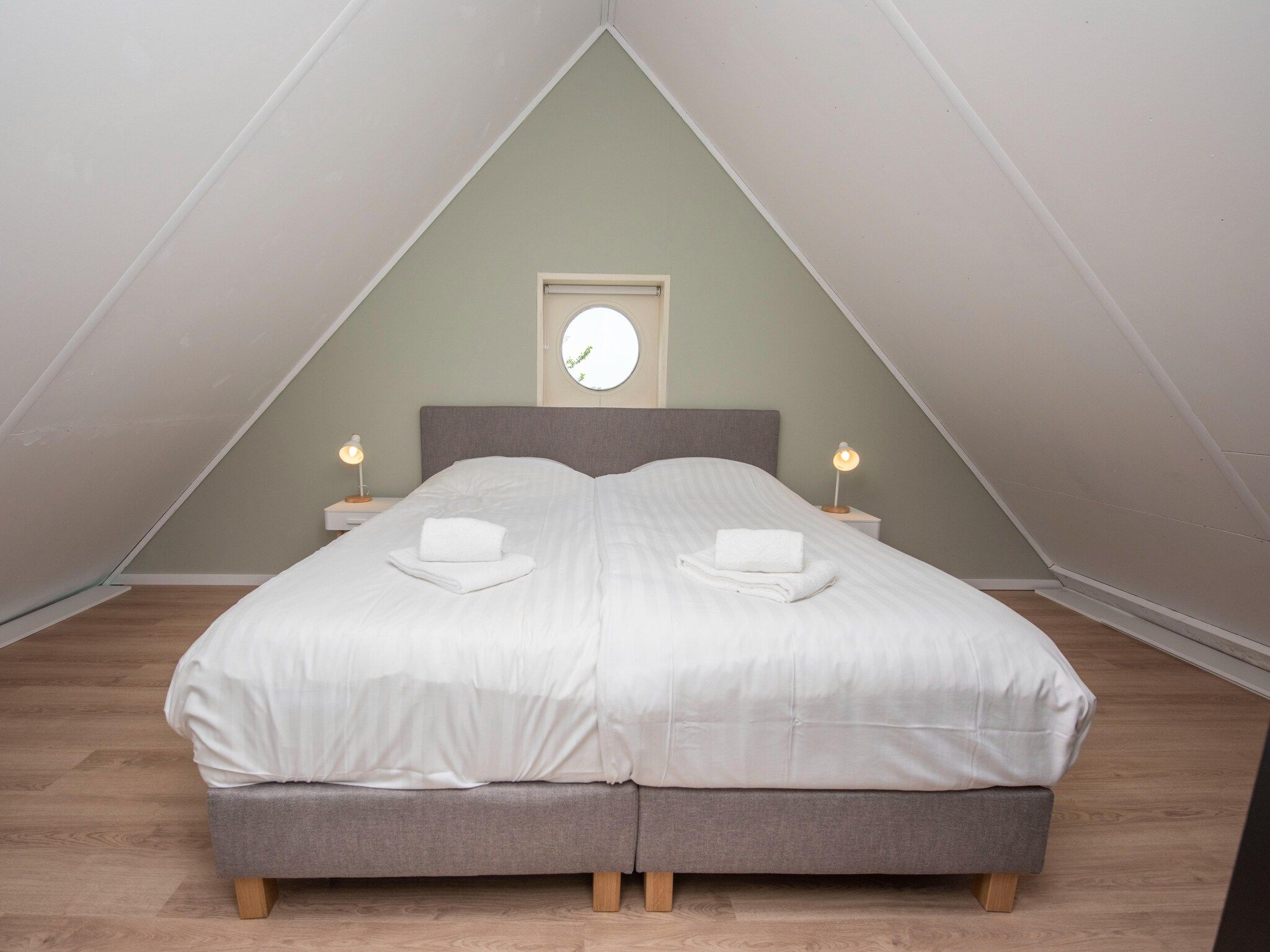 Een slaapkamer van Villa aan het water in Terherne in Terherne