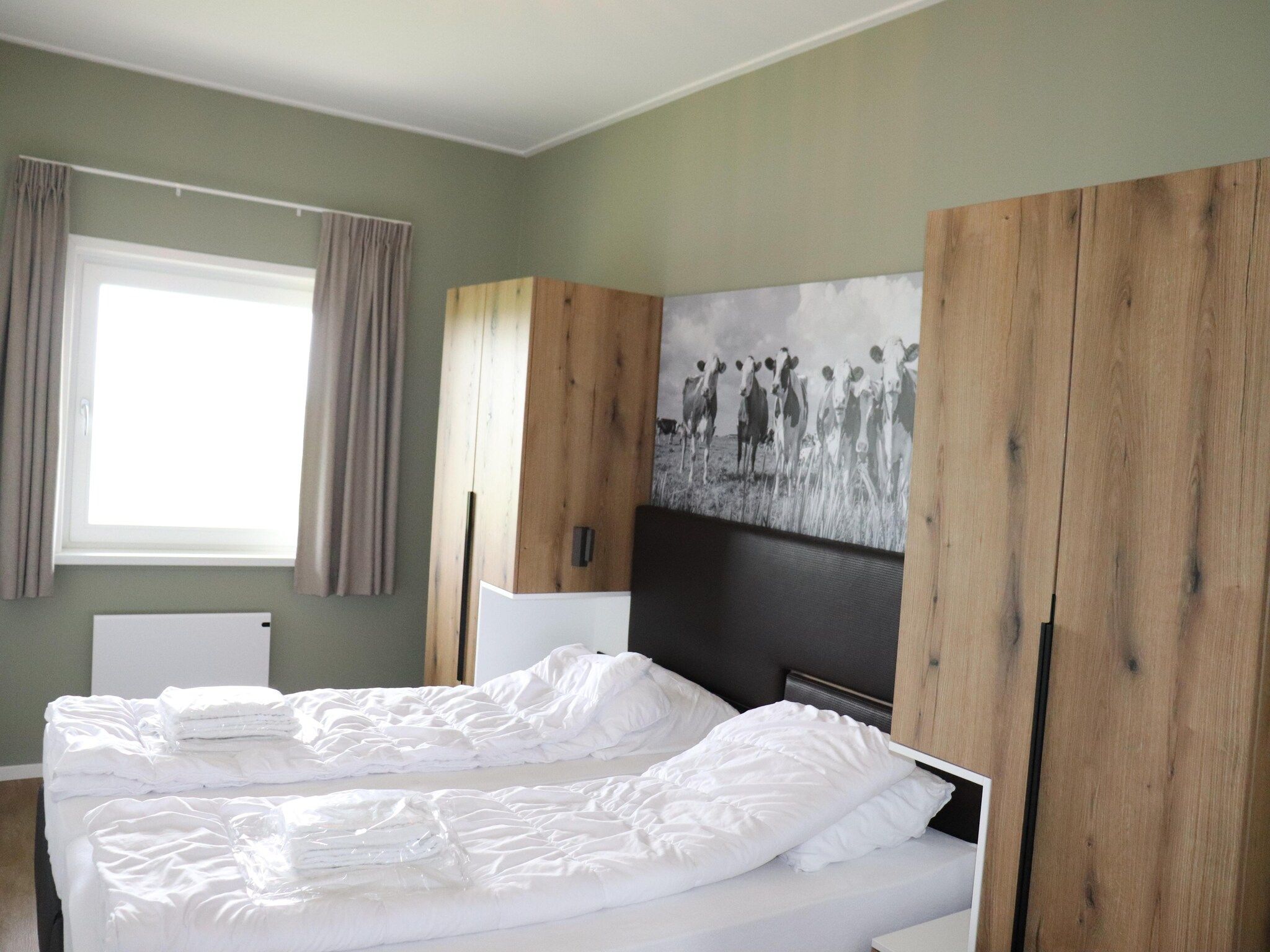 Een slaapkamer van 20 persoons villa in Leons