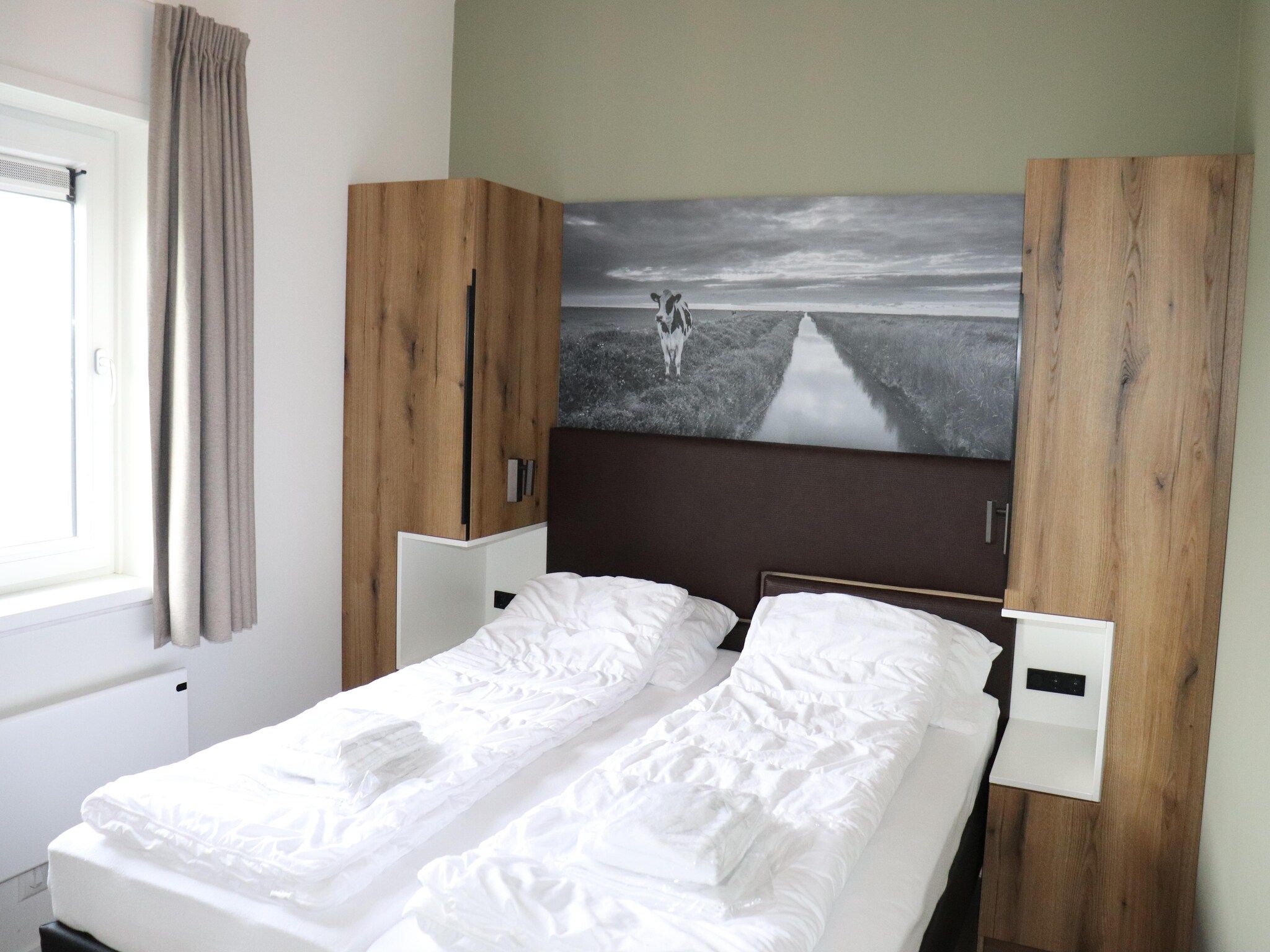 Een slaapkamer van 20 persoons villa in Leons
