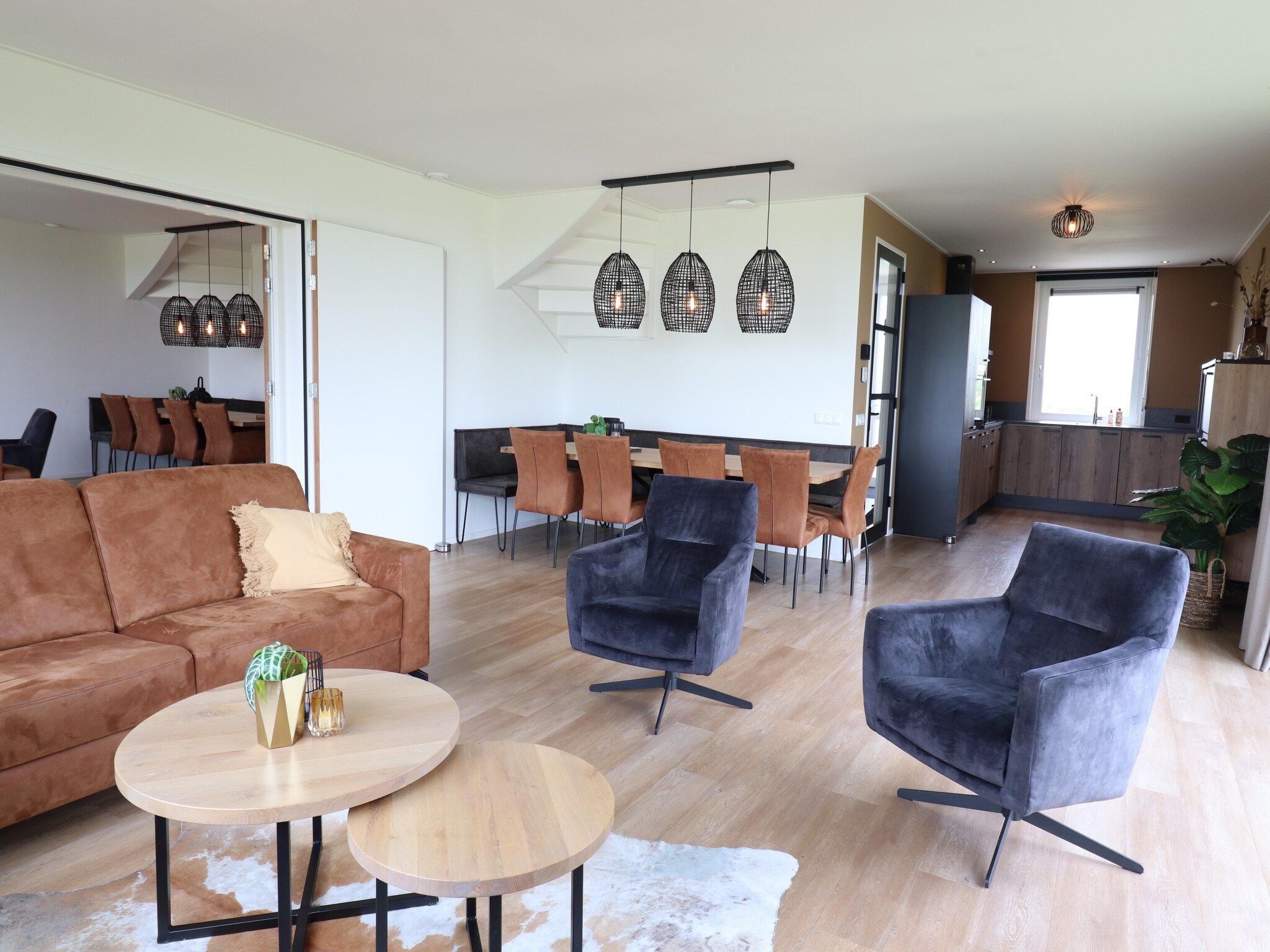 De woonkamer van 20 persoons villa in Leons