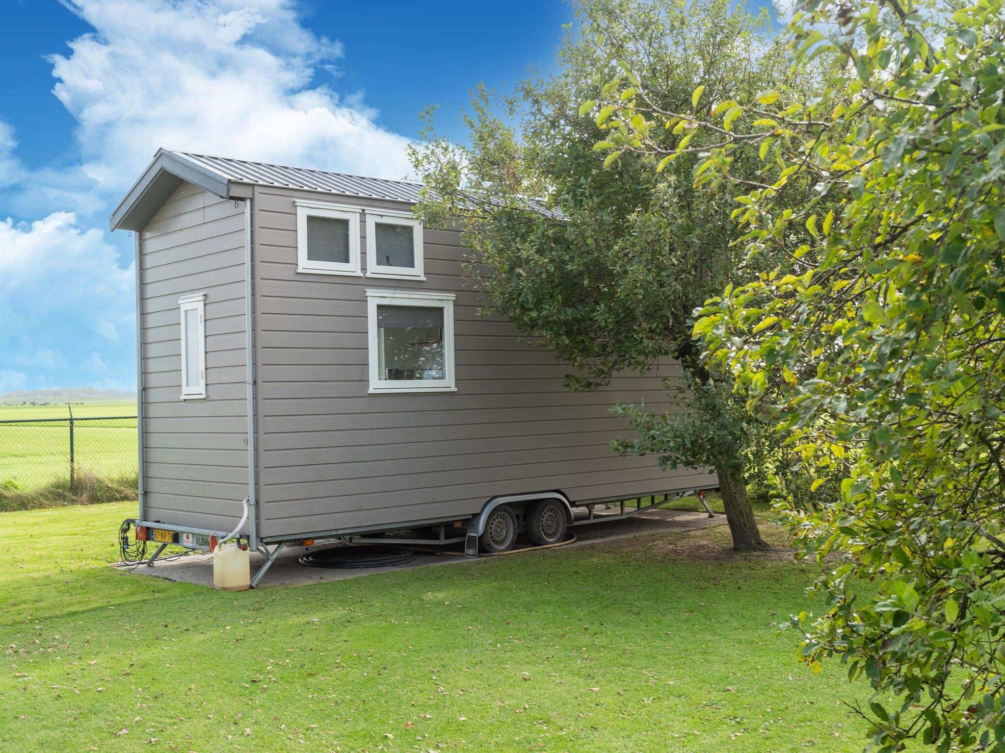 De buitenkant van Tiny House in Burgerbrug