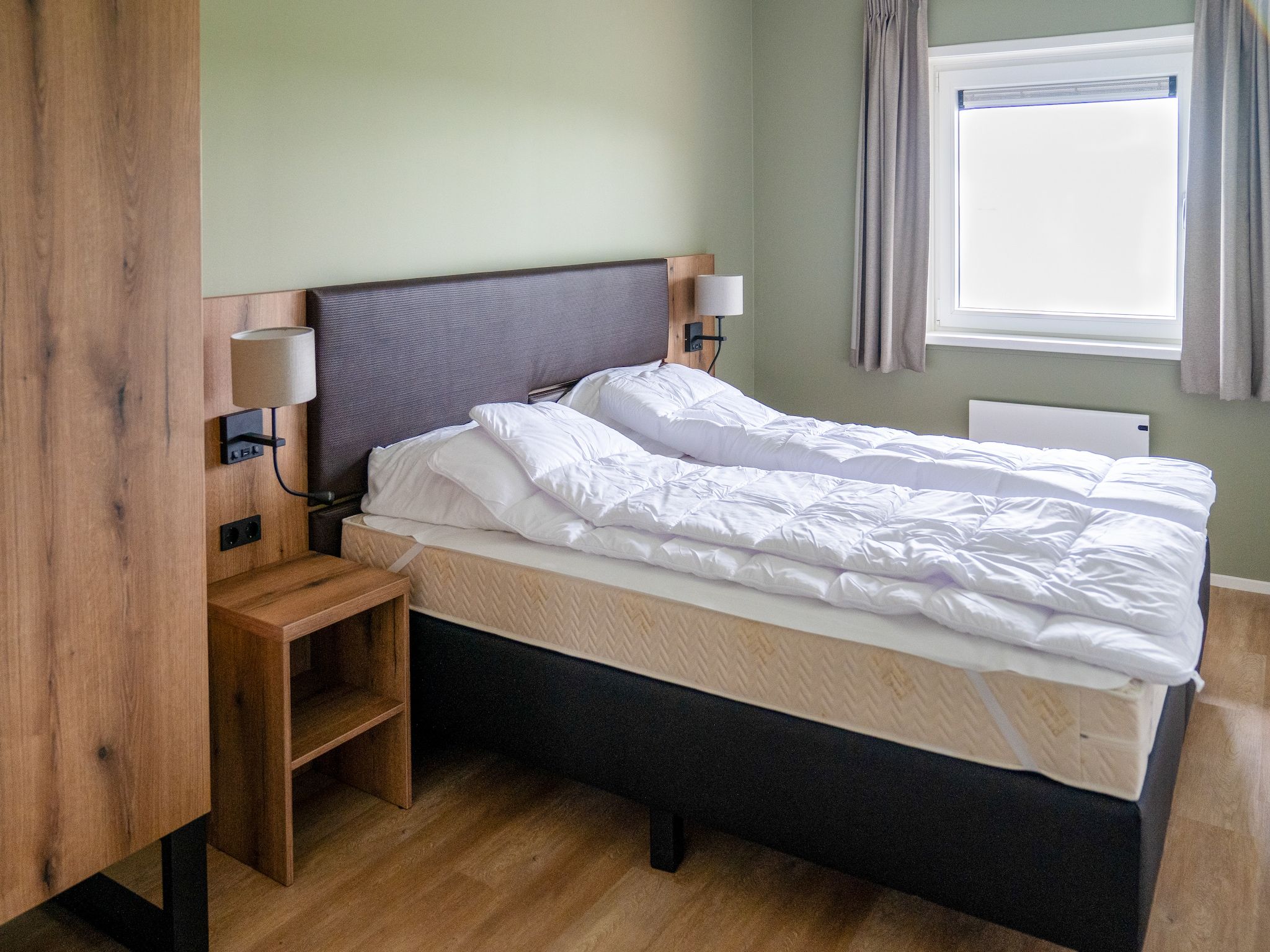 Een slaapkamer van Friese Villa in Leons in Leons