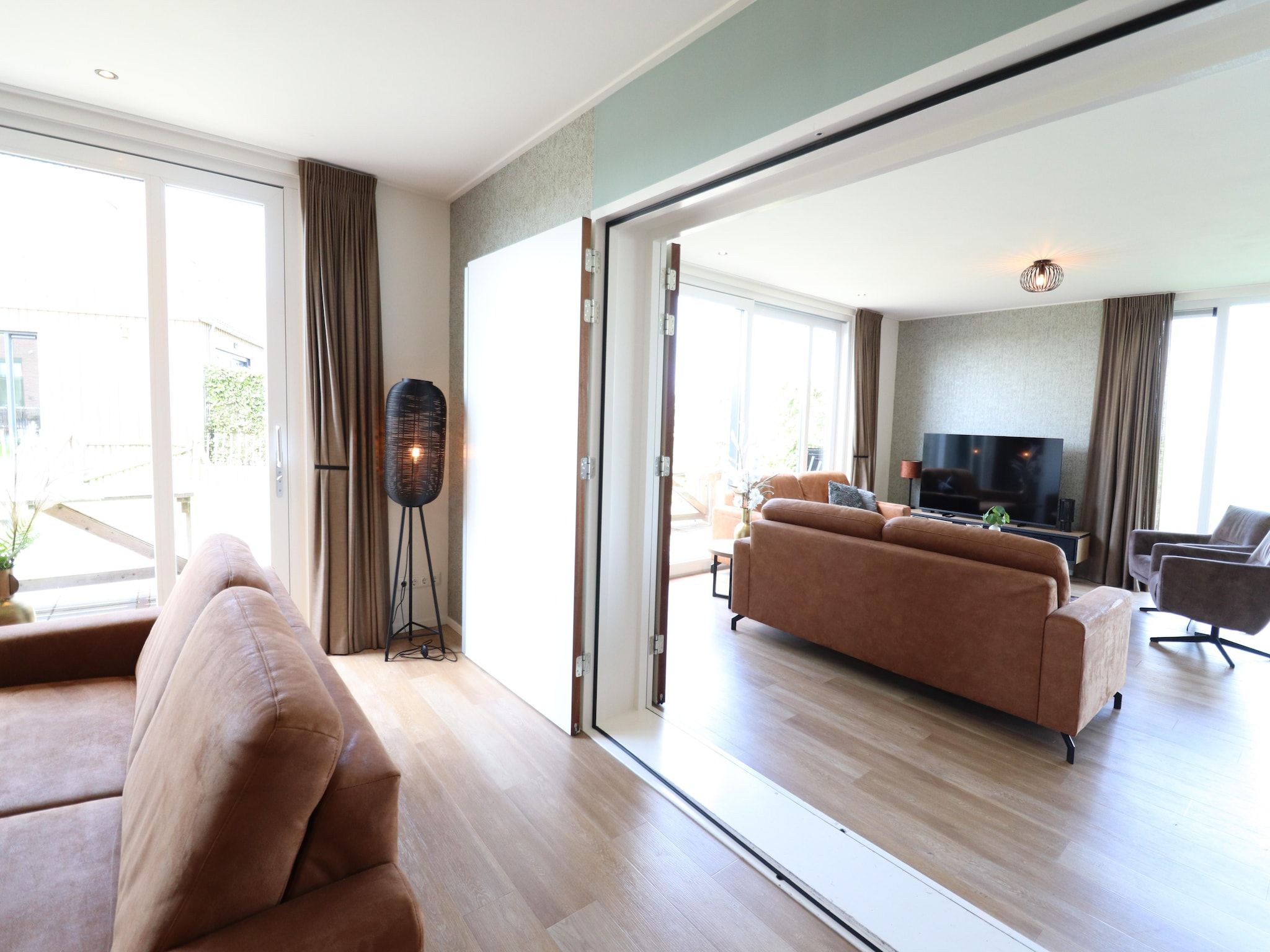 De woonkamer van 20 persoons villa in Leons