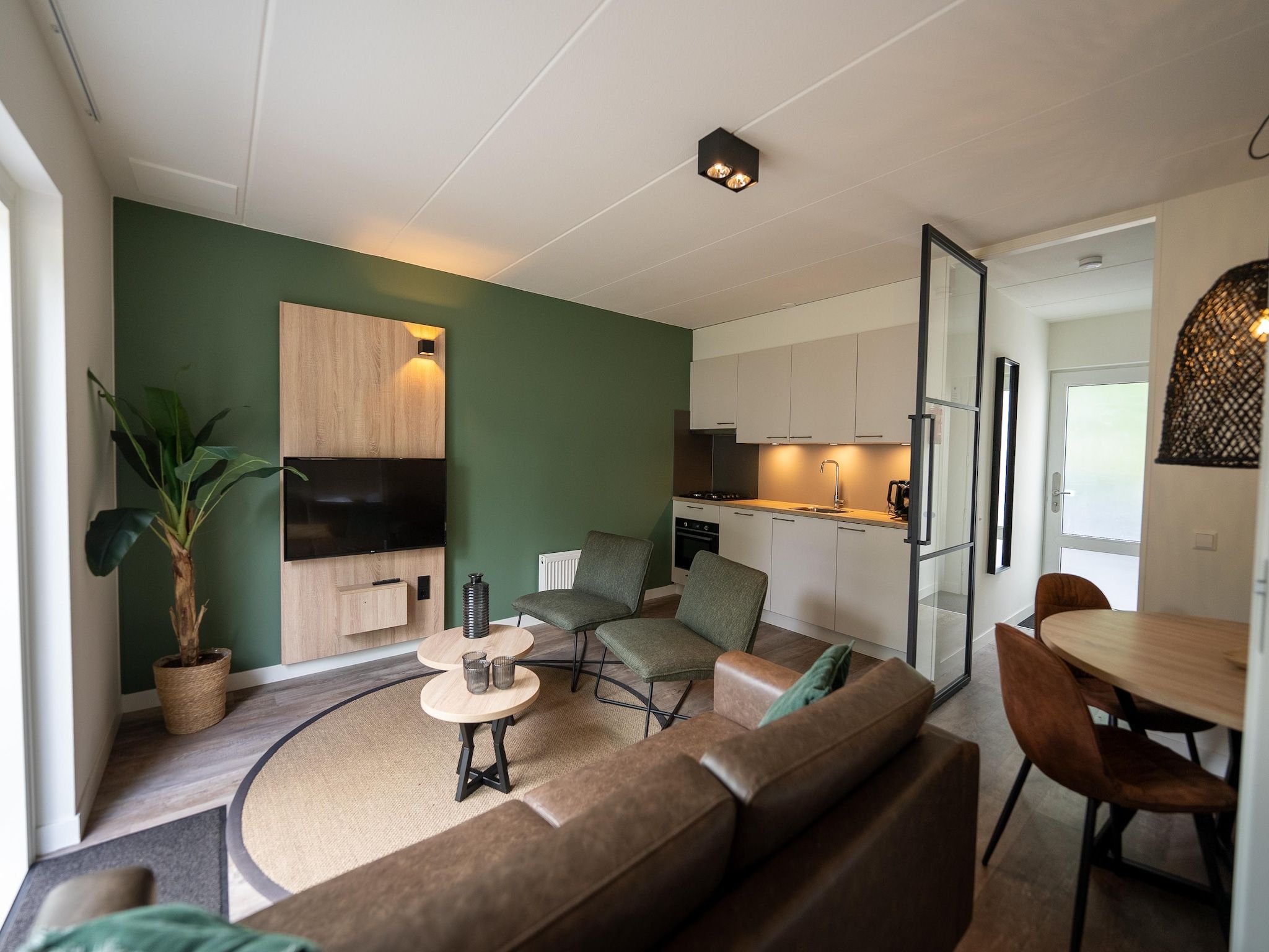 De woonkamer van Vakantiepark Hunzedal 18 in Borger