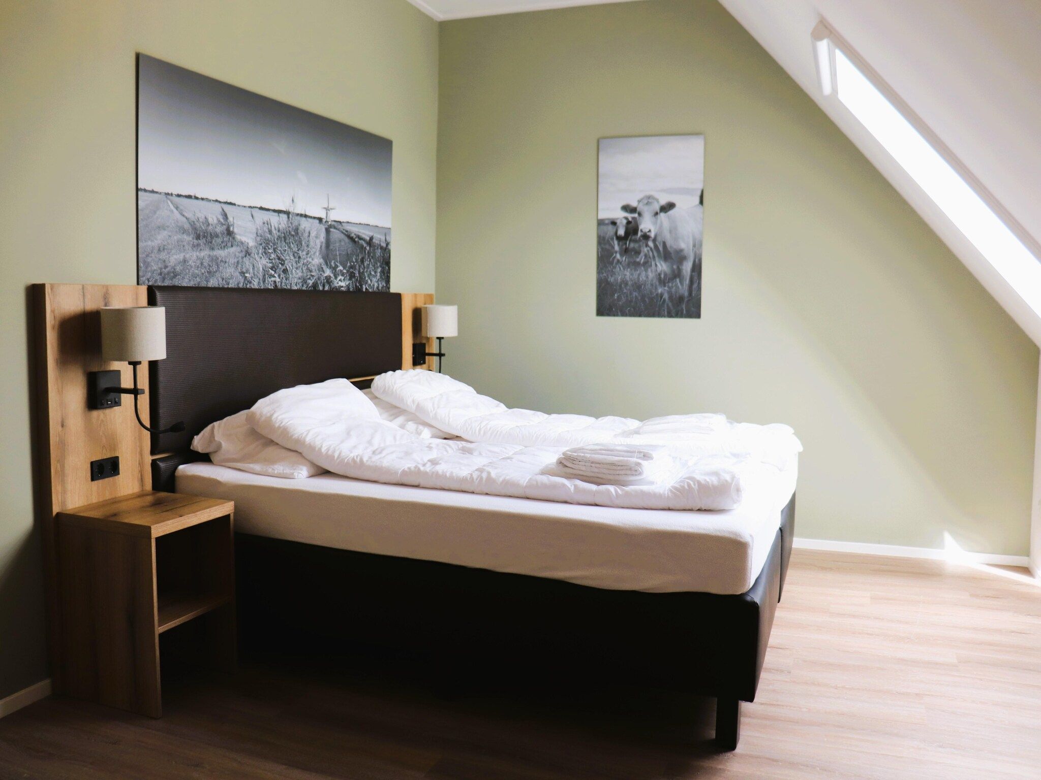 Een slaapkamer van combinatie van 2x 10 persoons woning in Leons
