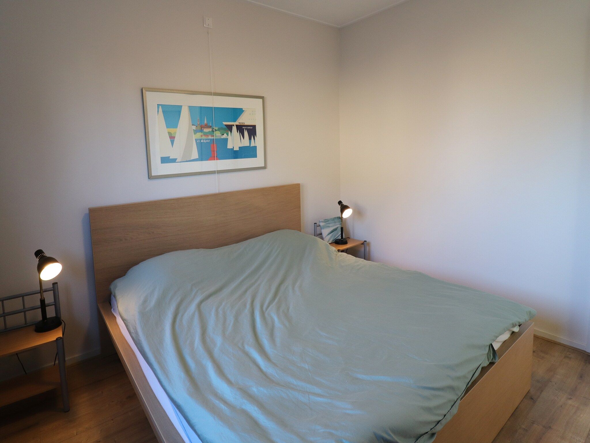 Een slaapkamer van Appartement aan het meer in Heeg in Heeg