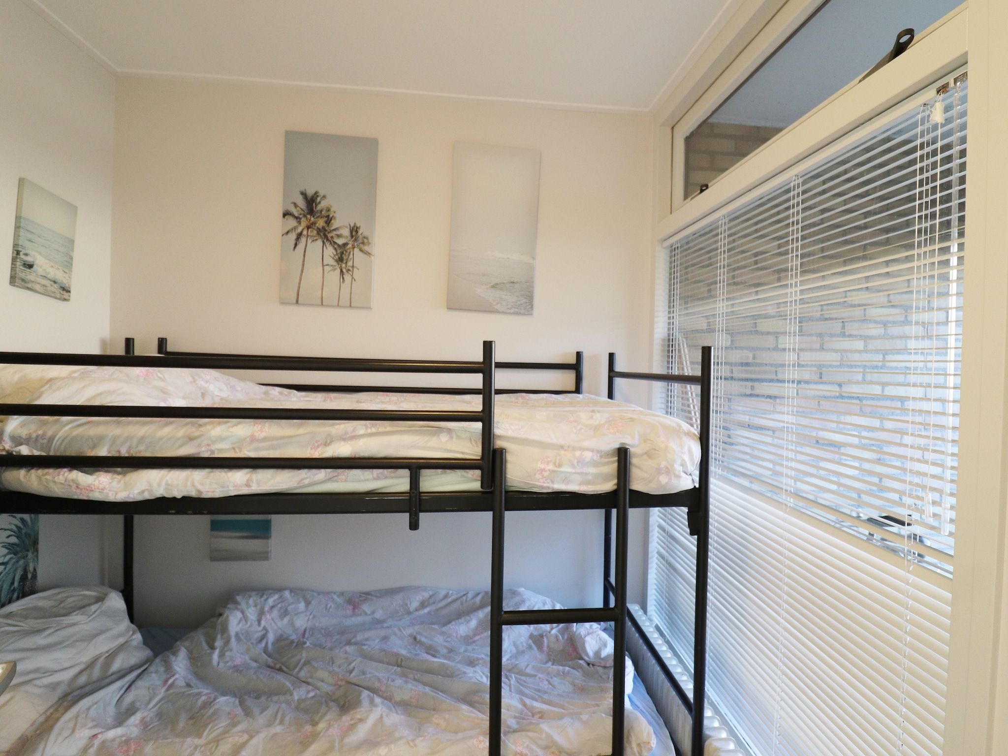 Een slaapkamer van Appartement aan het meer in Heeg in Heeg