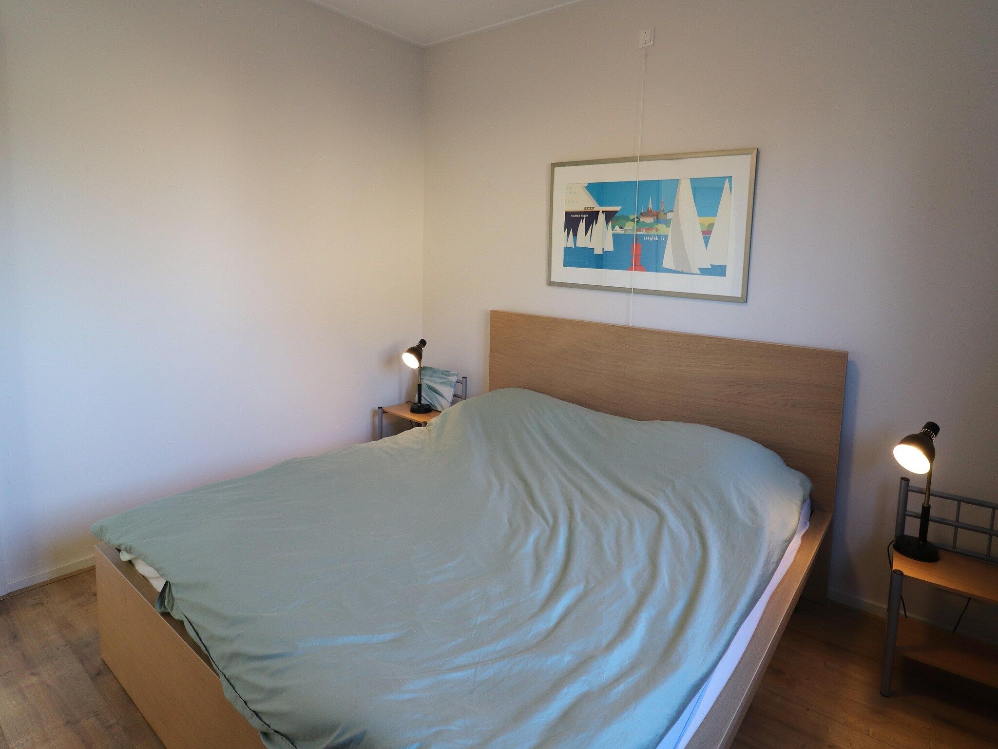 Een slaapkamer van Appartement aan het meer in Heeg in Heeg