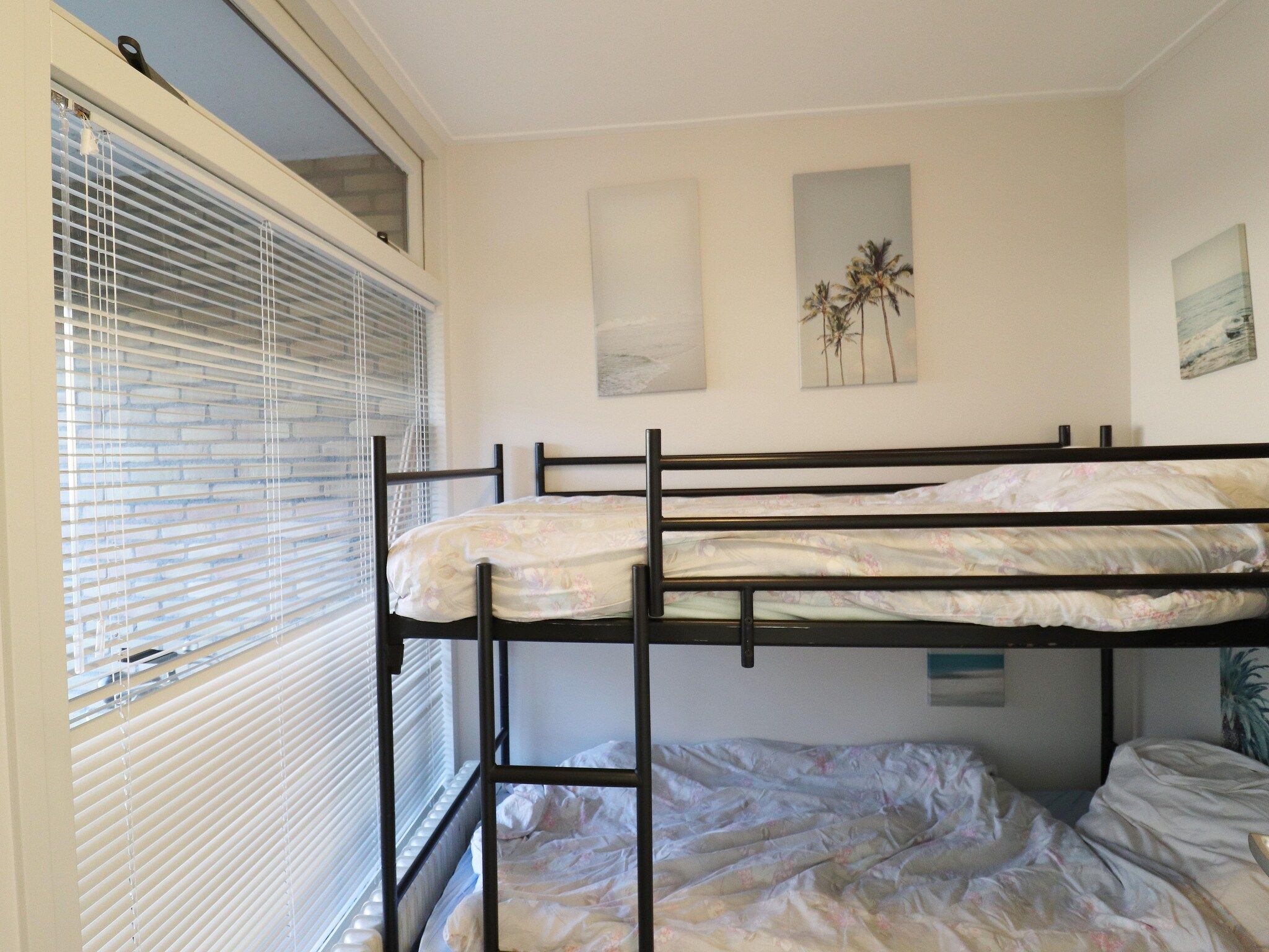 Een slaapkamer van Appartement aan het meer in Heeg in Heeg