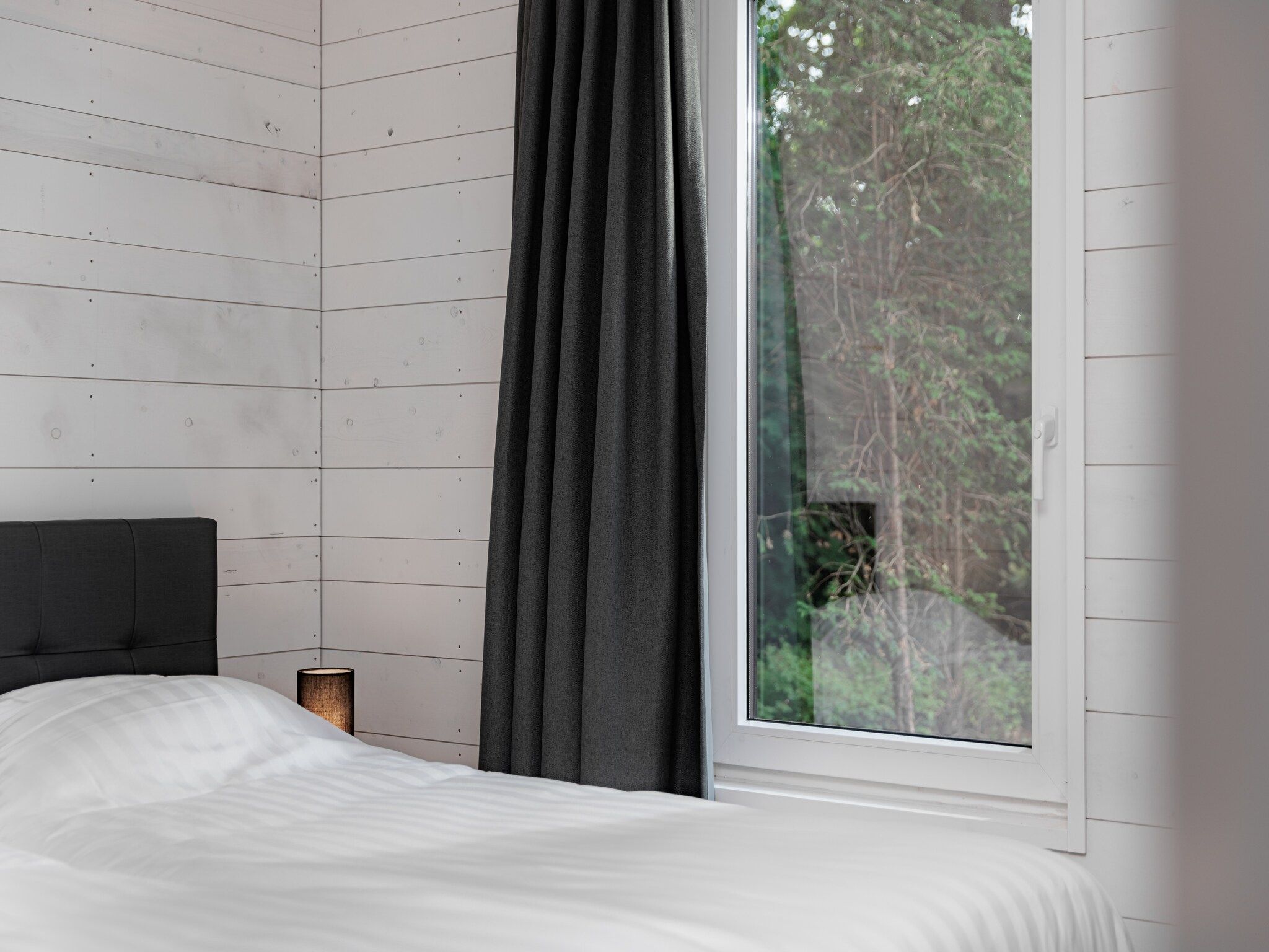 Een slaapkamer van Vakantiepark Schaijk 13 in Schaijk