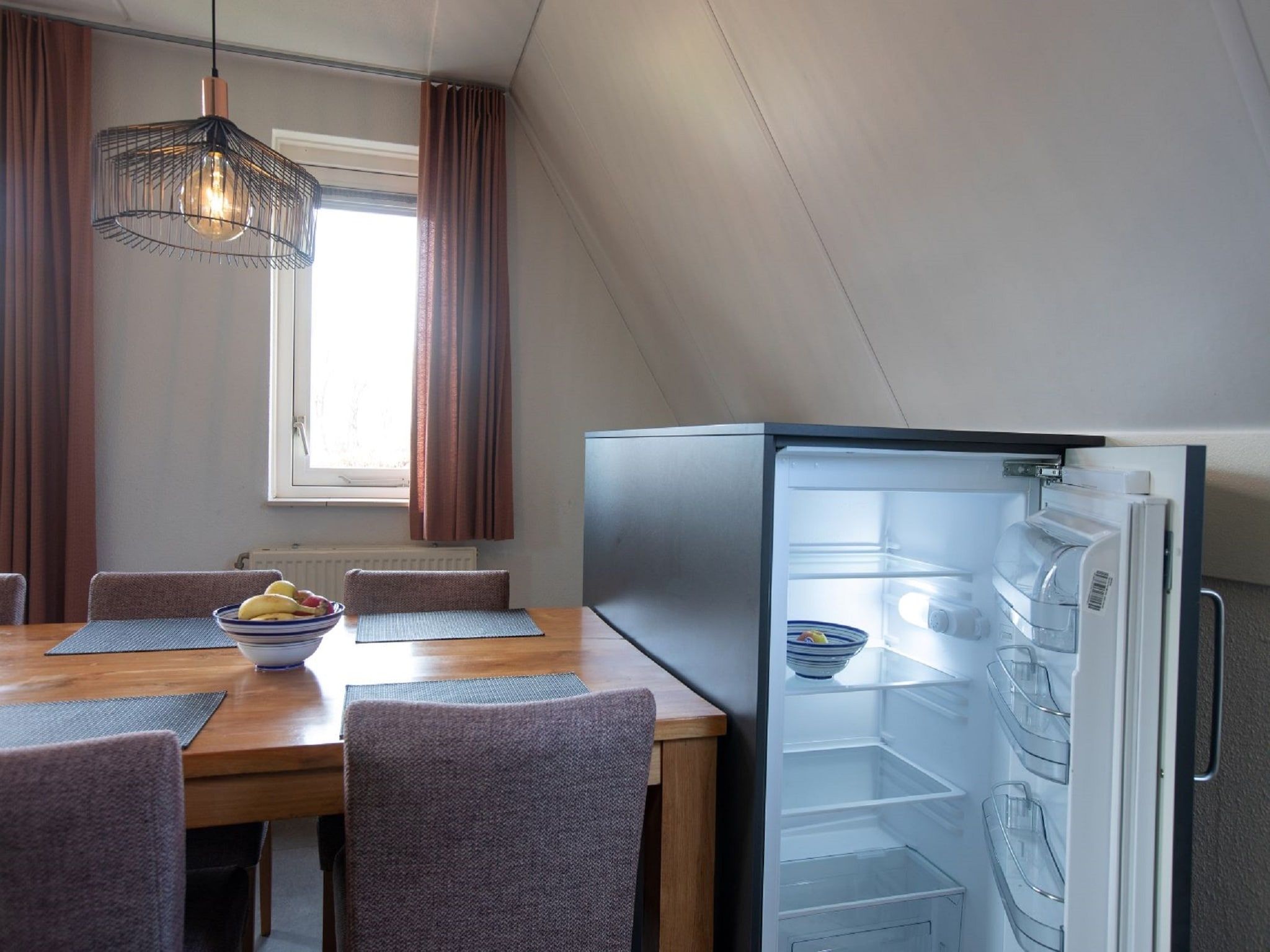 De eetkamer van Vakantie bij Meeussen - Molendal 3 in Plasmolen