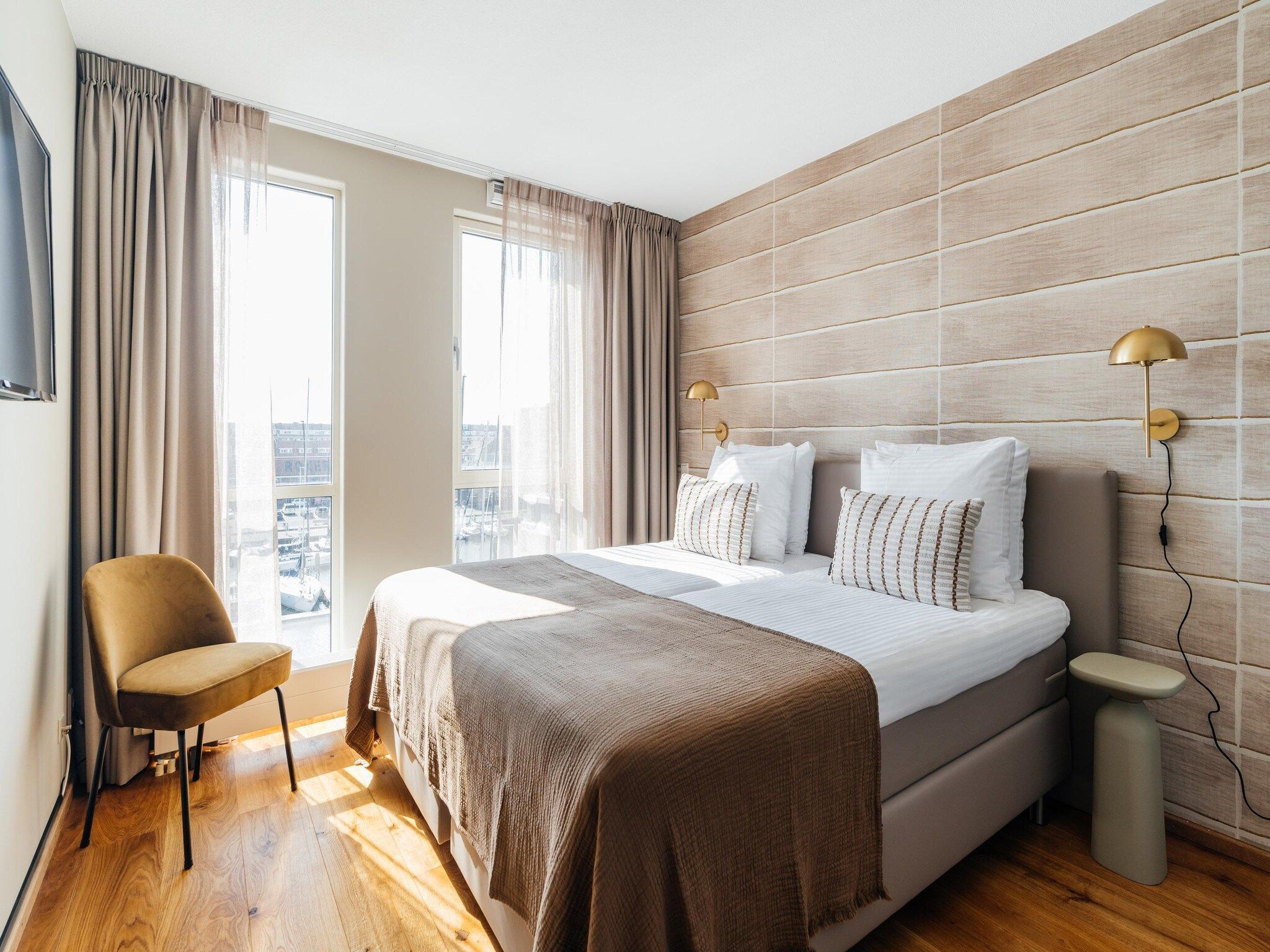 Een slaapkamer van Scheveningen Harbour 30A in Den Haag