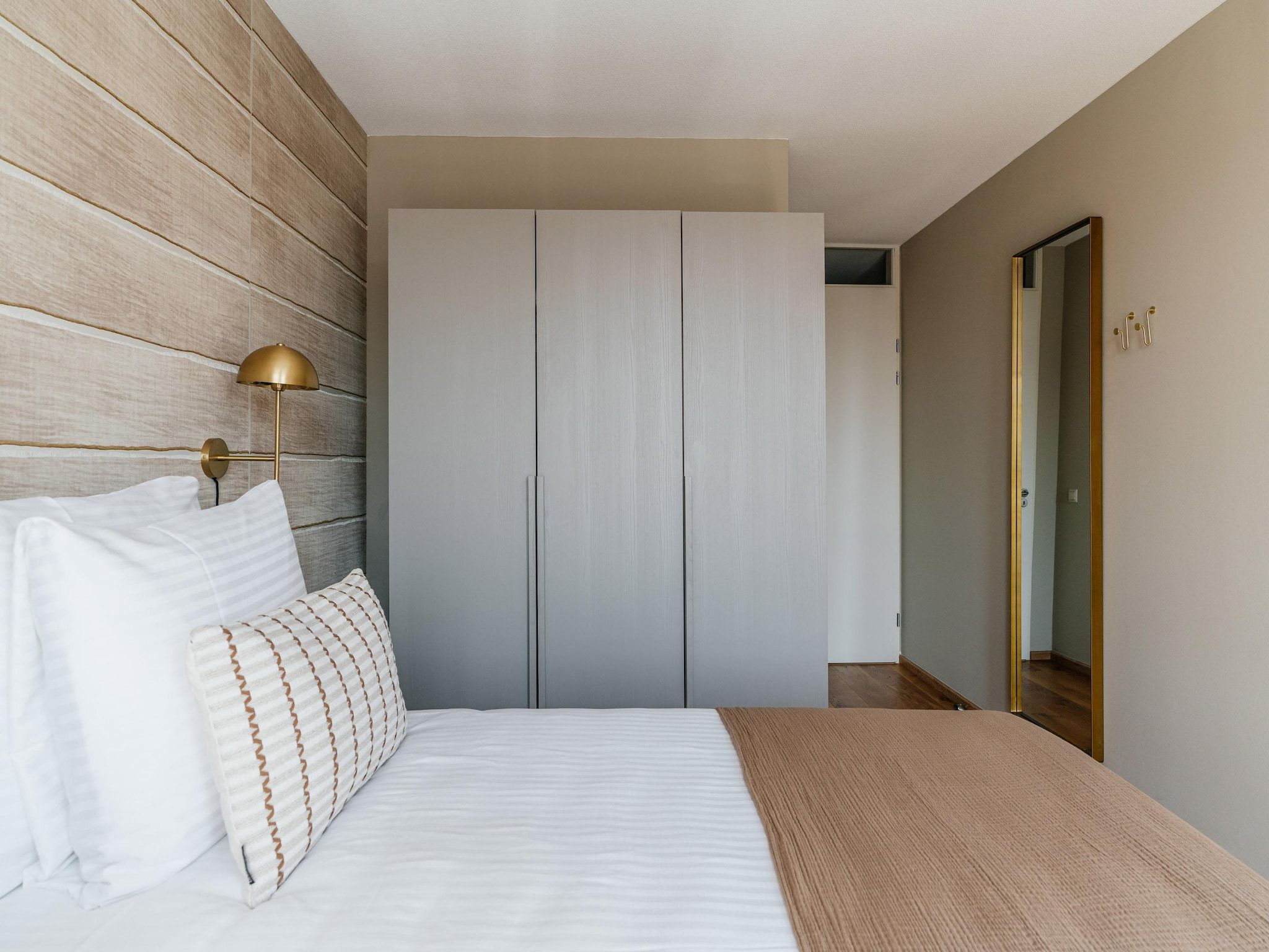 Een slaapkamer van Scheveningen Harbour 30A in Den Haag