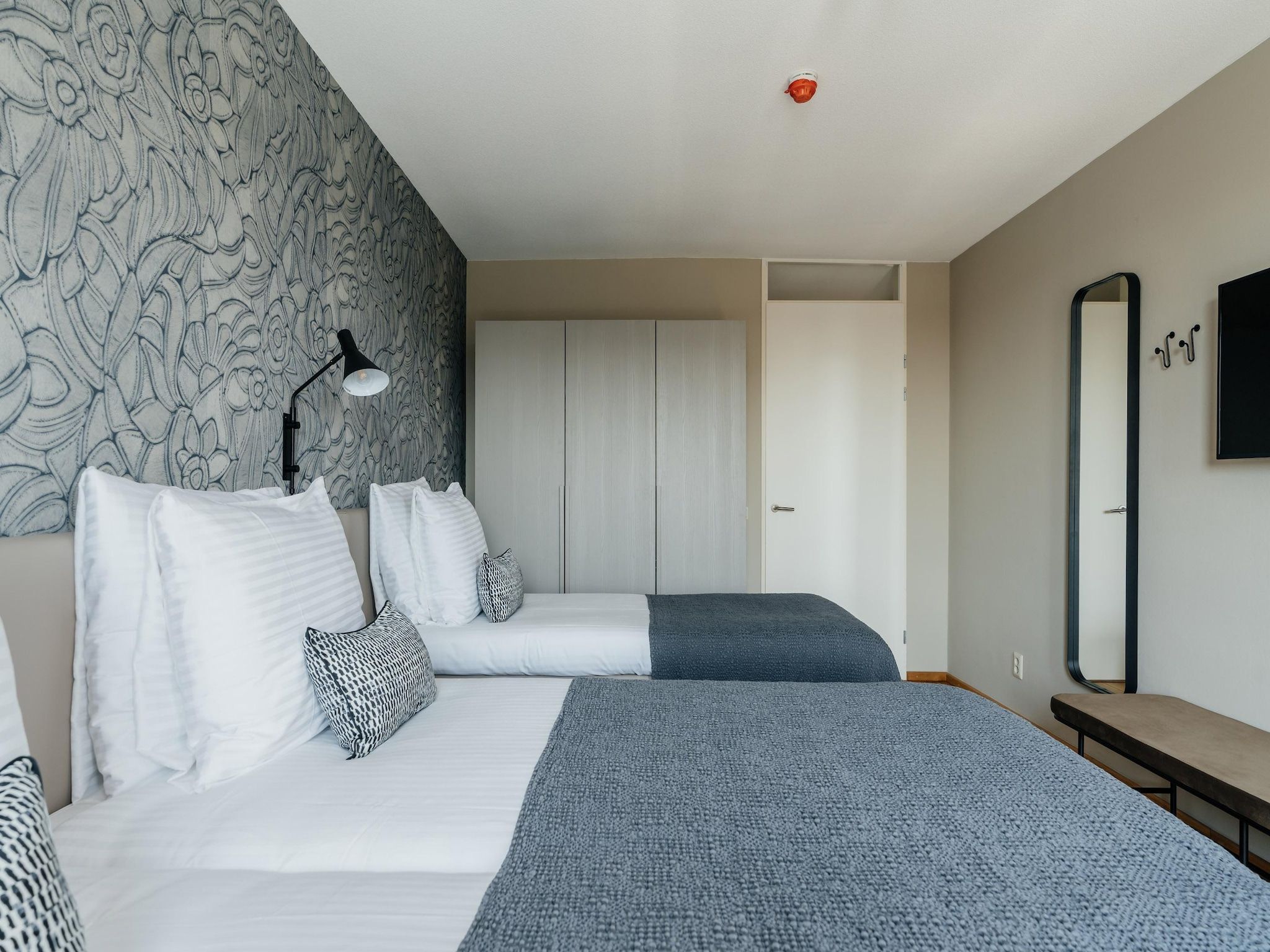 Een slaapkamer van Scheveningen Harbour 12 in Scheveningen