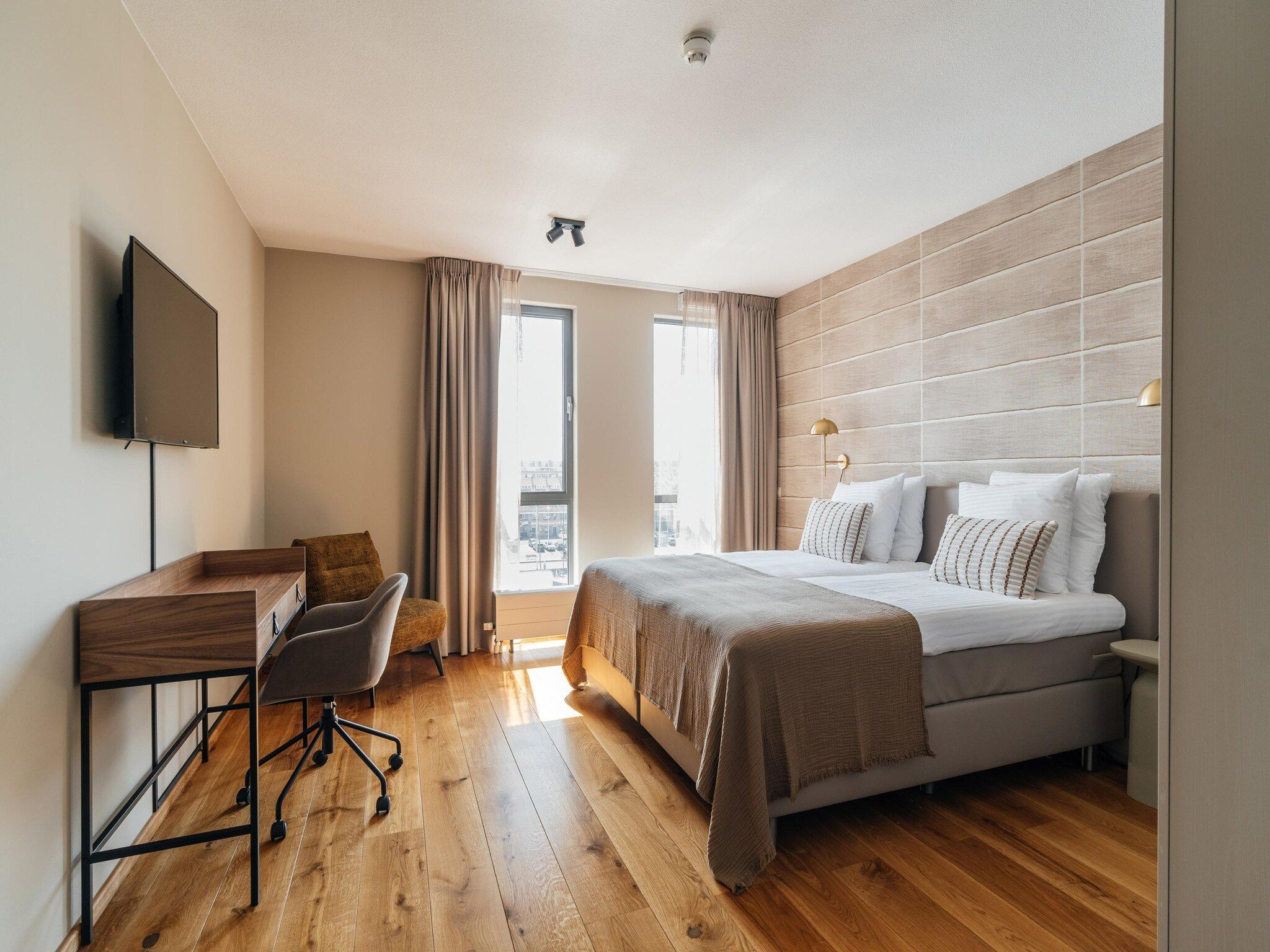 Een slaapkamer van Scheveningen Harbour 12 in Scheveningen