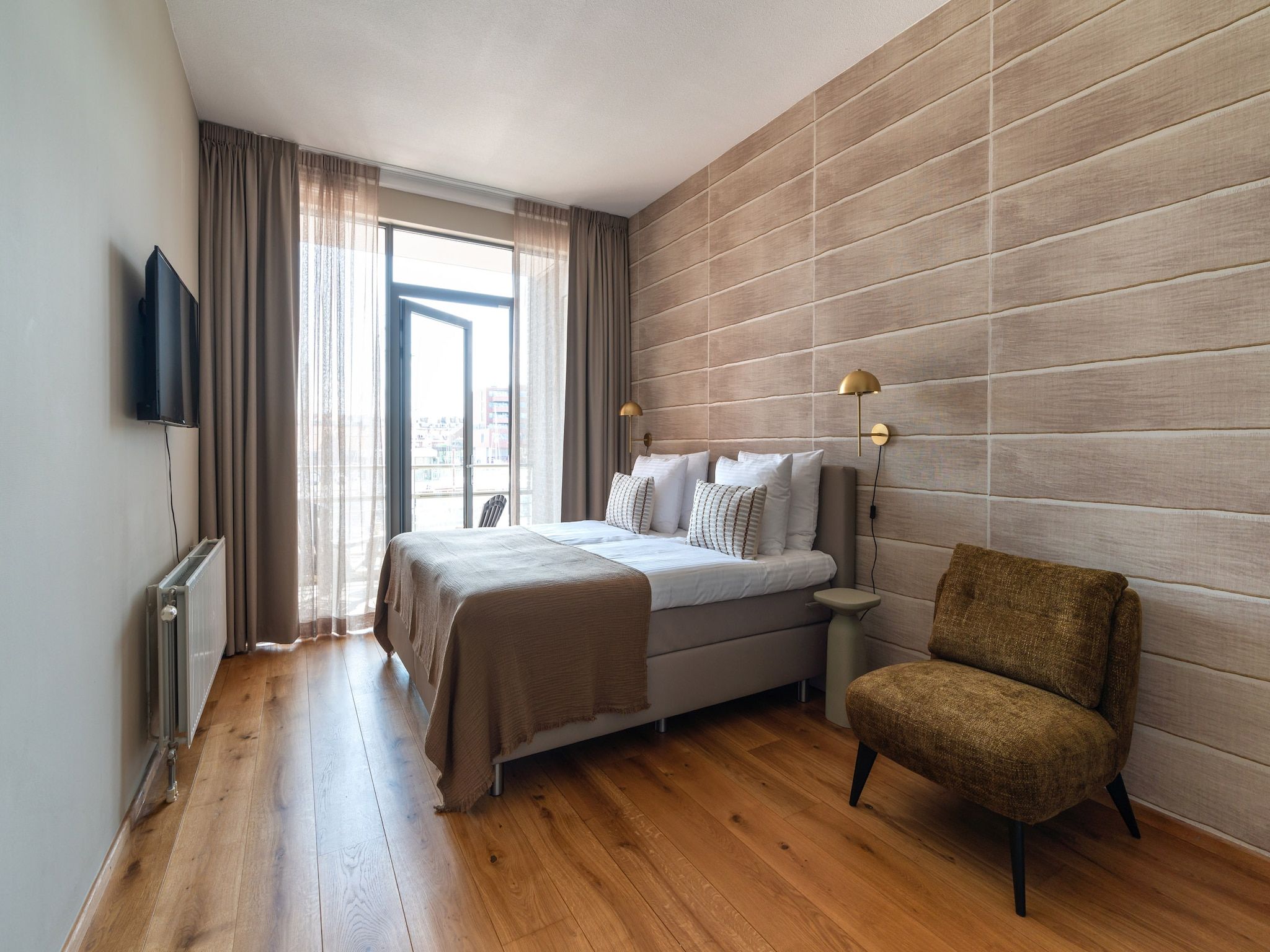 Een slaapkamer van Scheveningen Harbour 18B in Scheveningen