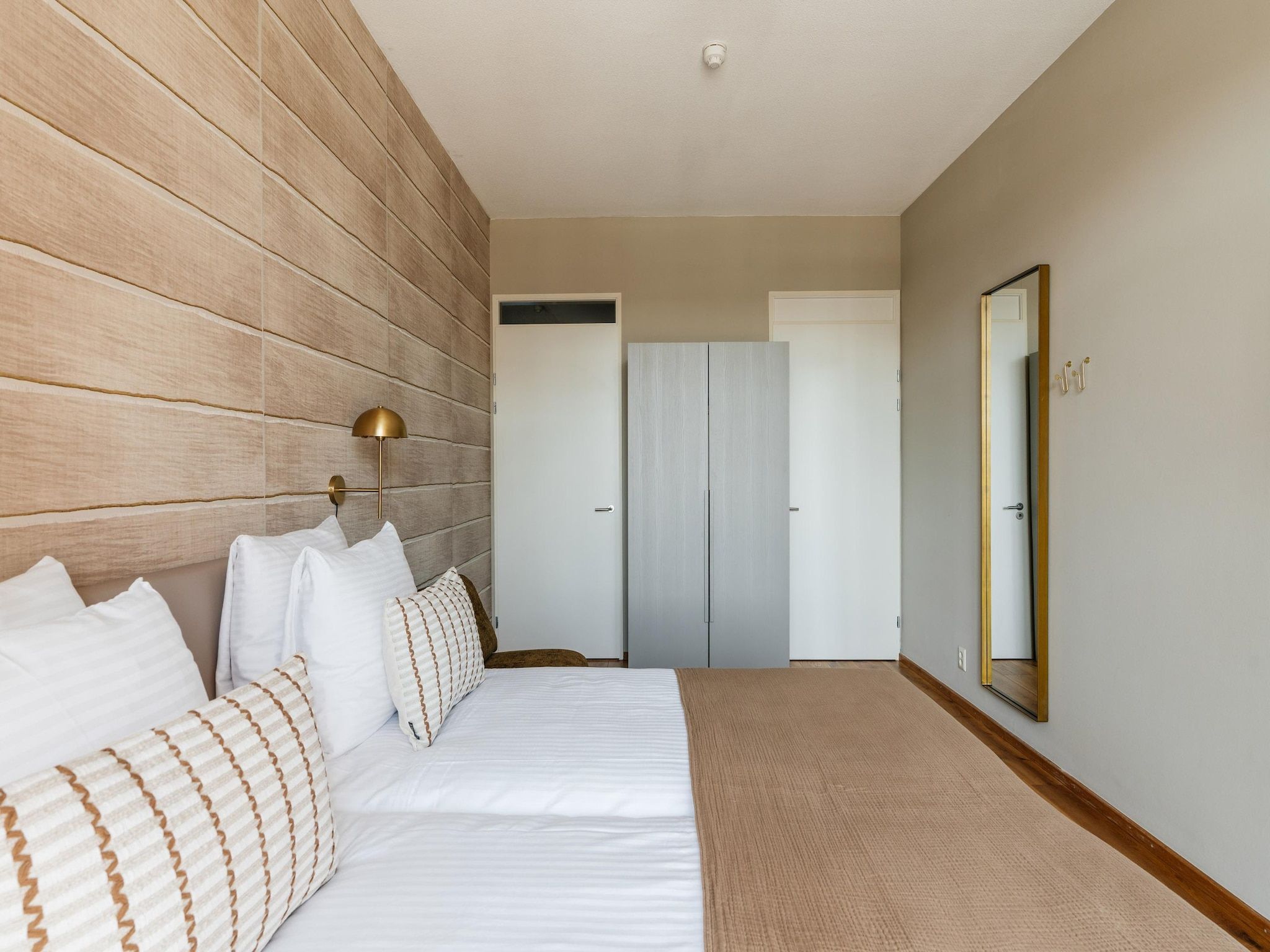 Een slaapkamer van Scheveningen Harbour 18B in Scheveningen