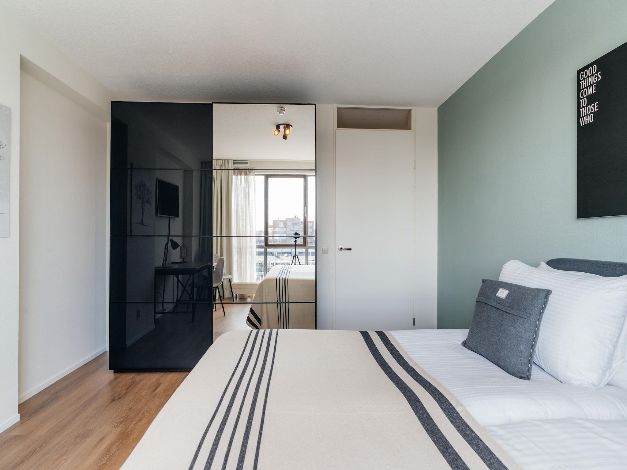 Een slaapkamer van Scheveningen Harbour 80B in Scheveningen
