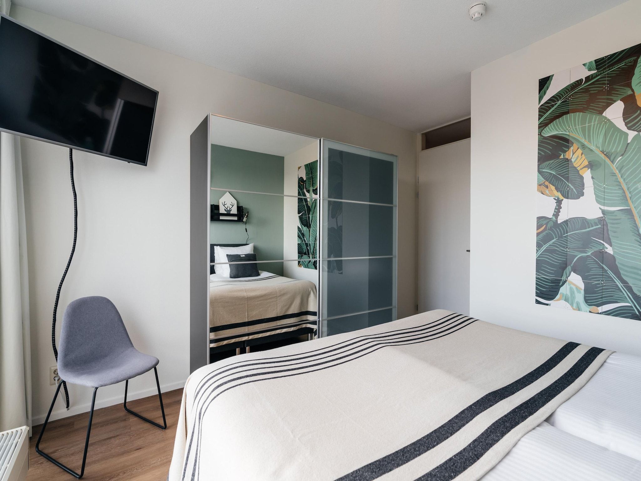 Een slaapkamer van Scheveningen Harbour 80B in Scheveningen