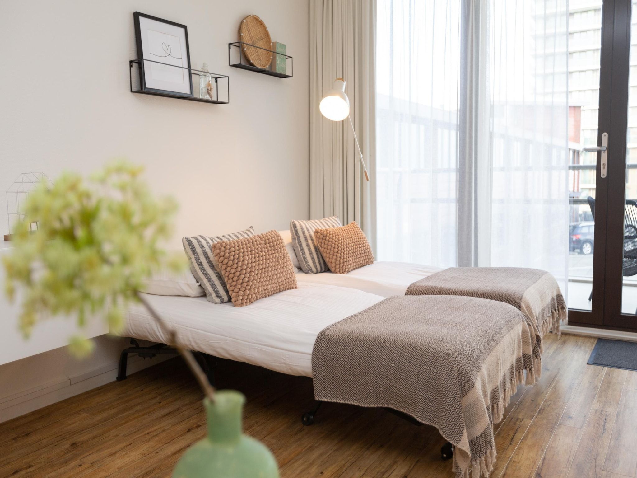 Een slaapkamer van Scheveningen Harbour 76 in Den Haag