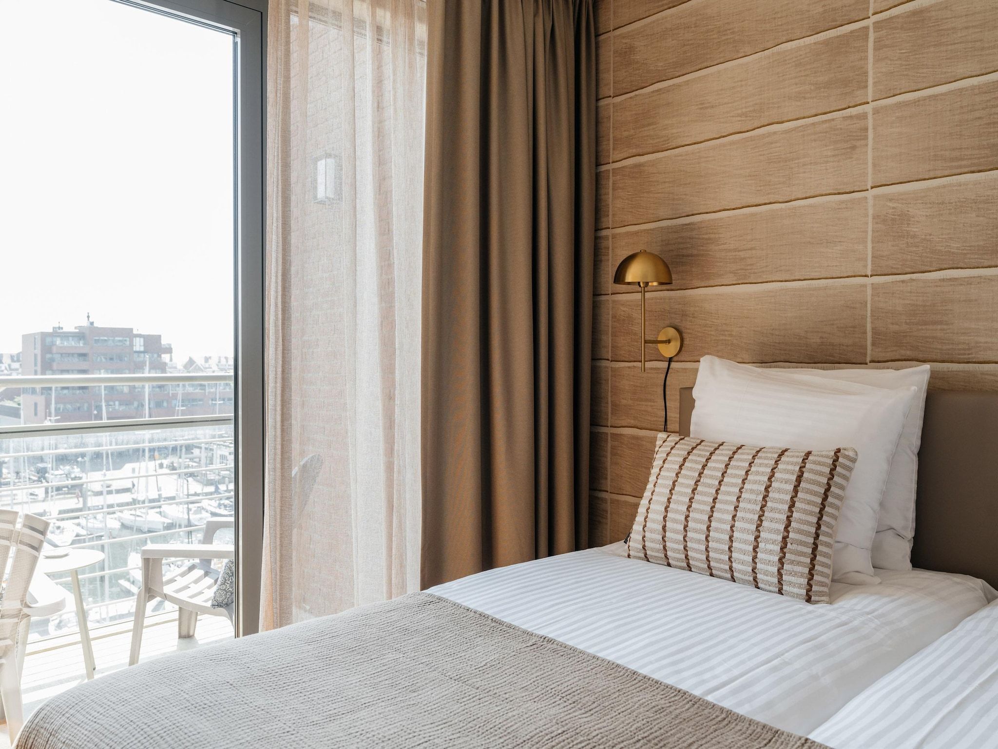 Een slaapkamer van Scheveningen Harbour 40B in Den Haag