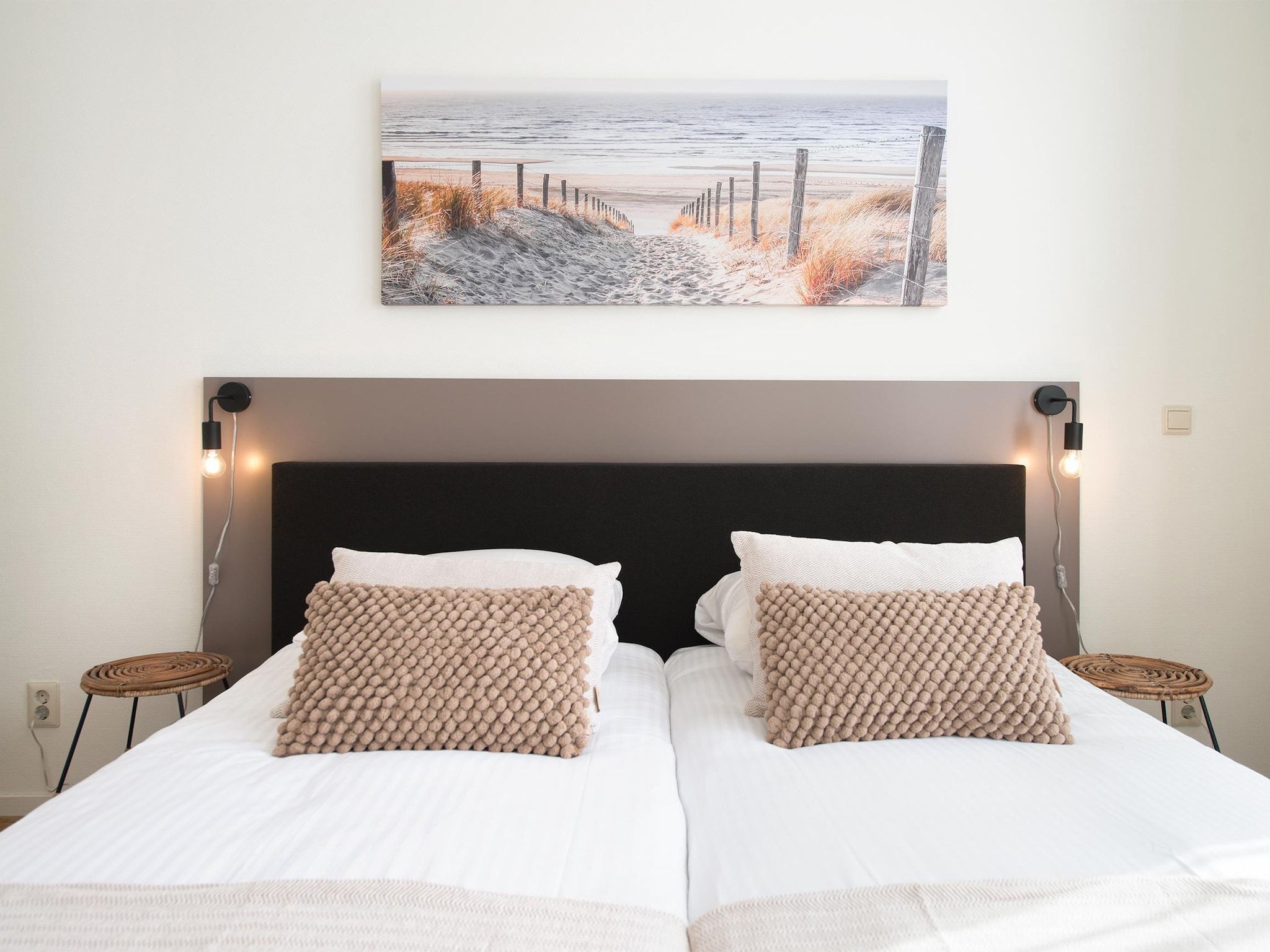 Een slaapkamer van Scheveningen Harbour 56A in Den Haag