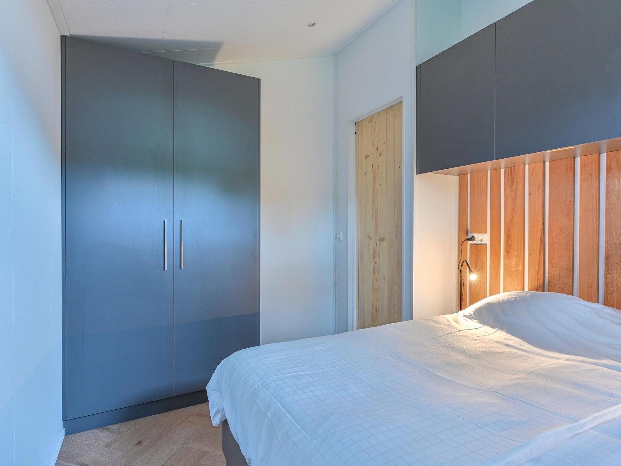 Een slaapkamer van Resort Drentse Weelde 1 in Hoogersmilde