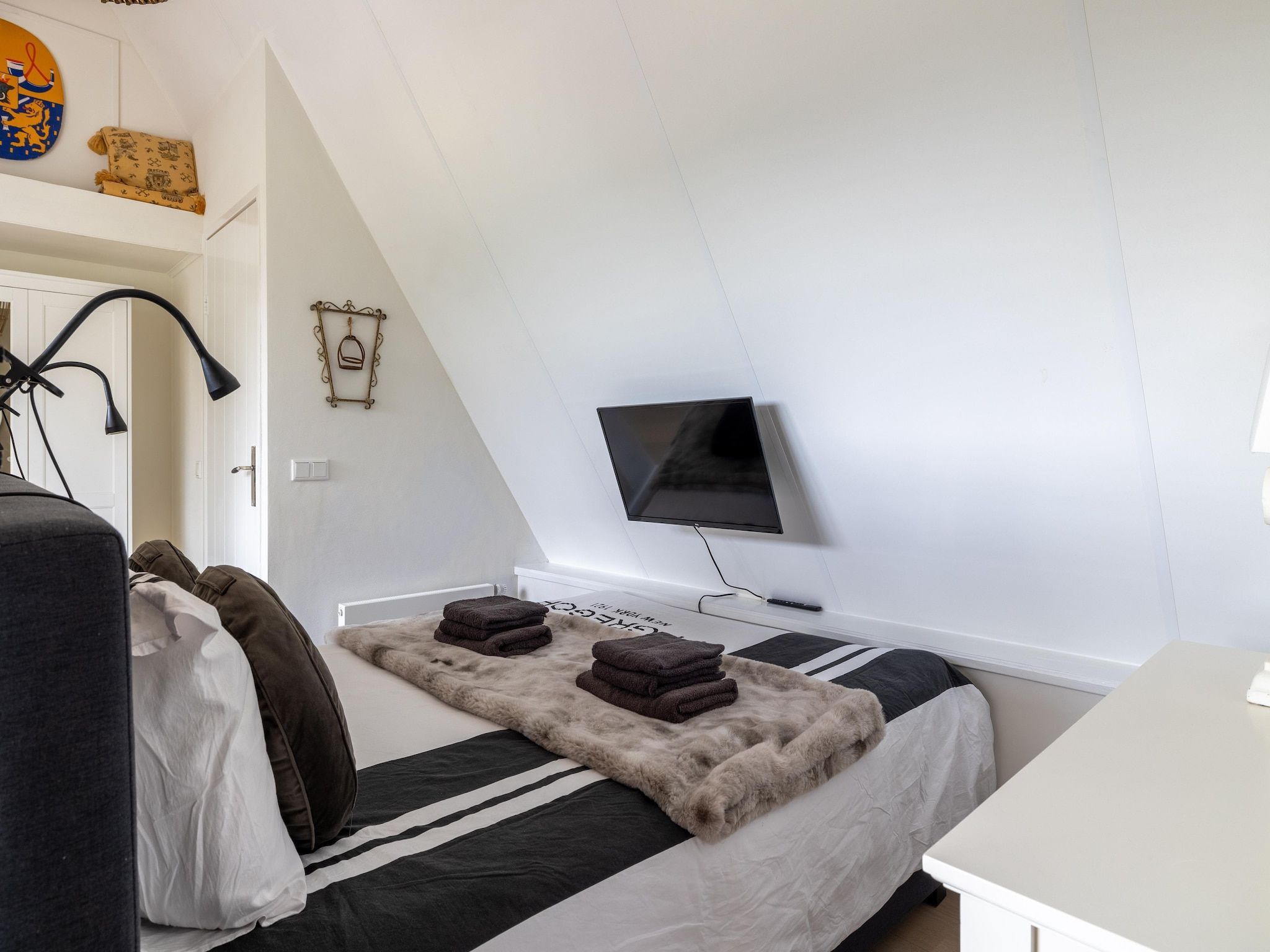Een slaapkamer van Sloestraat 38  Zoutelande 'Het Koetshuys' in Zoutelande