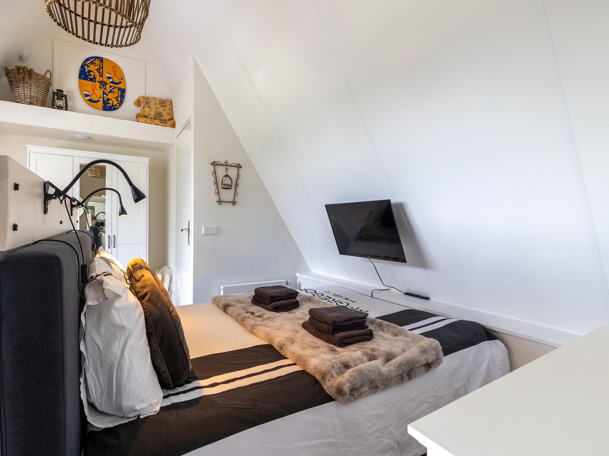 Een slaapkamer van Sloestraat 38  Zoutelande 'Het Koetshuys' in Zoutelande