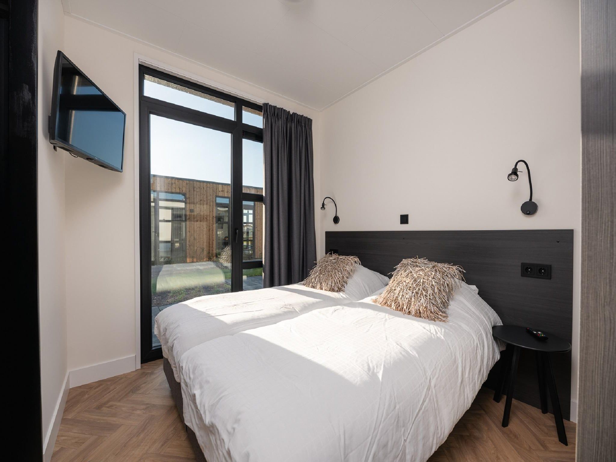 Een slaapkamer van MarinaPark Nieuw Loosdrecht 3 in Nieuw-Loosdrecht