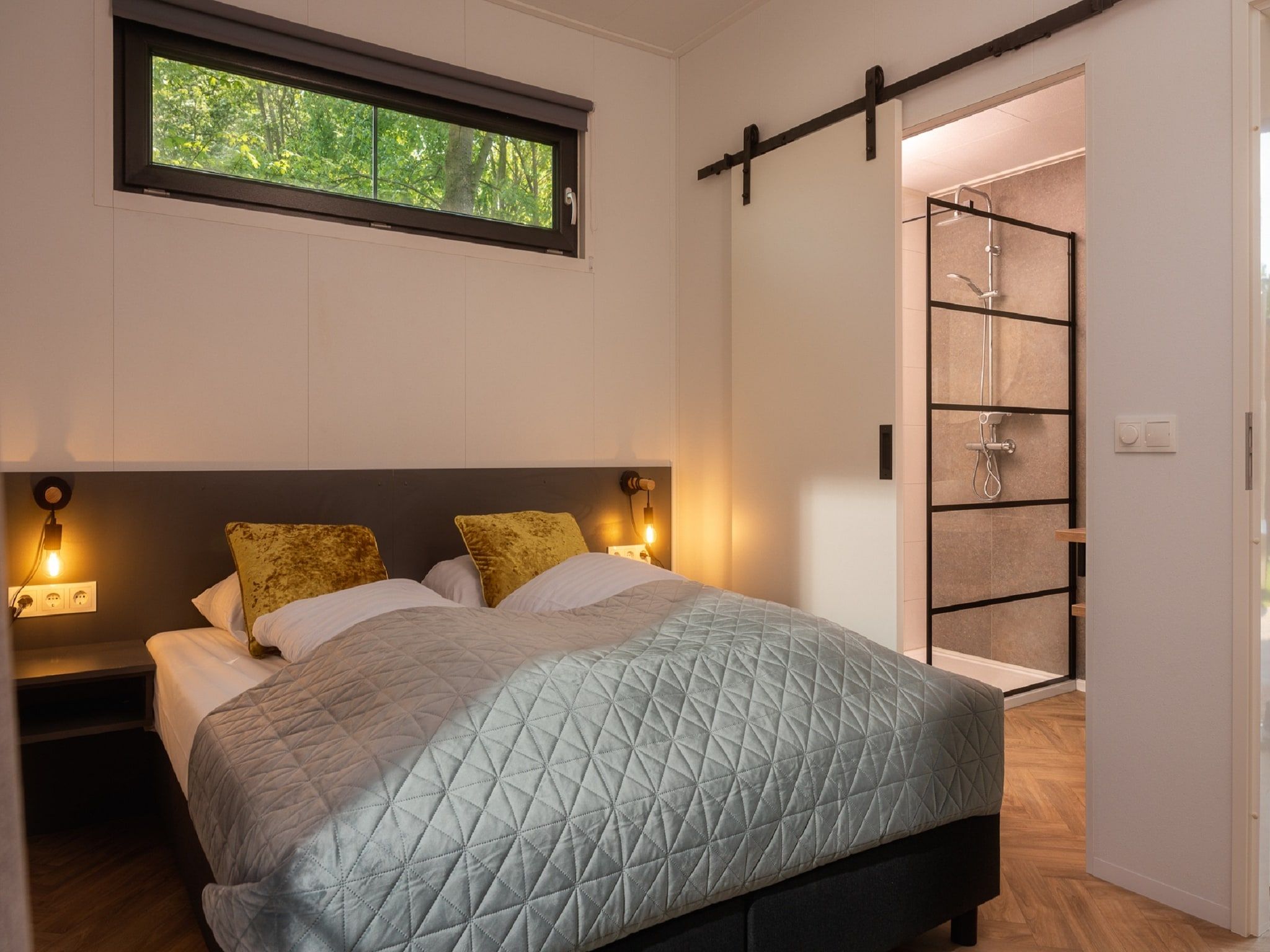 Een slaapkamer van Buitenplaats Holten 21 in Rijssen