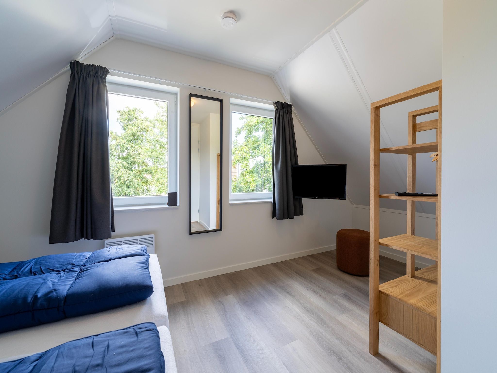 Een slaapkamer van Kuifduiker 3 in Simonshaven