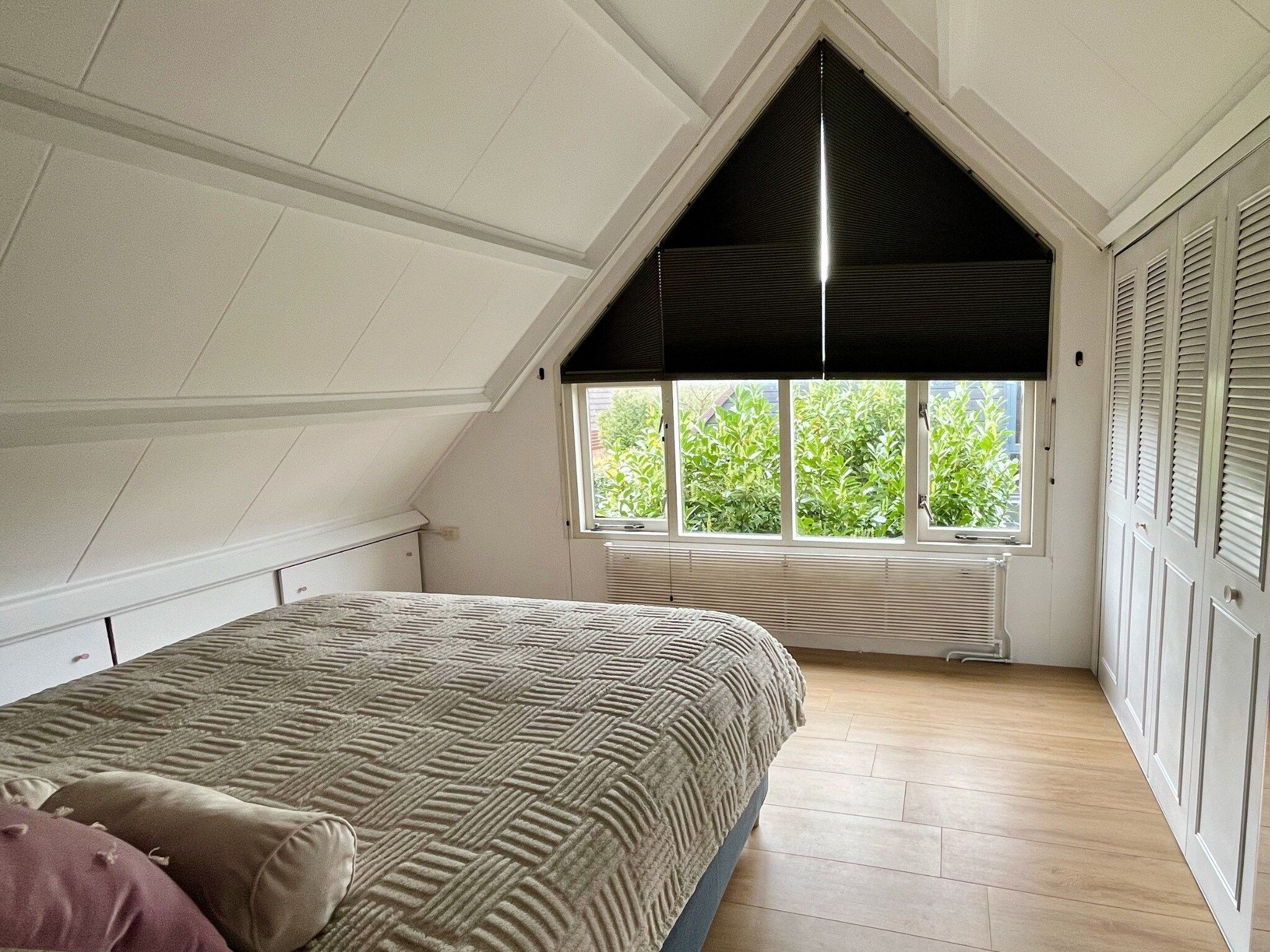 Een slaapkamer van Familiehuis in Noordwijkerhout in Noordwijkerhout
