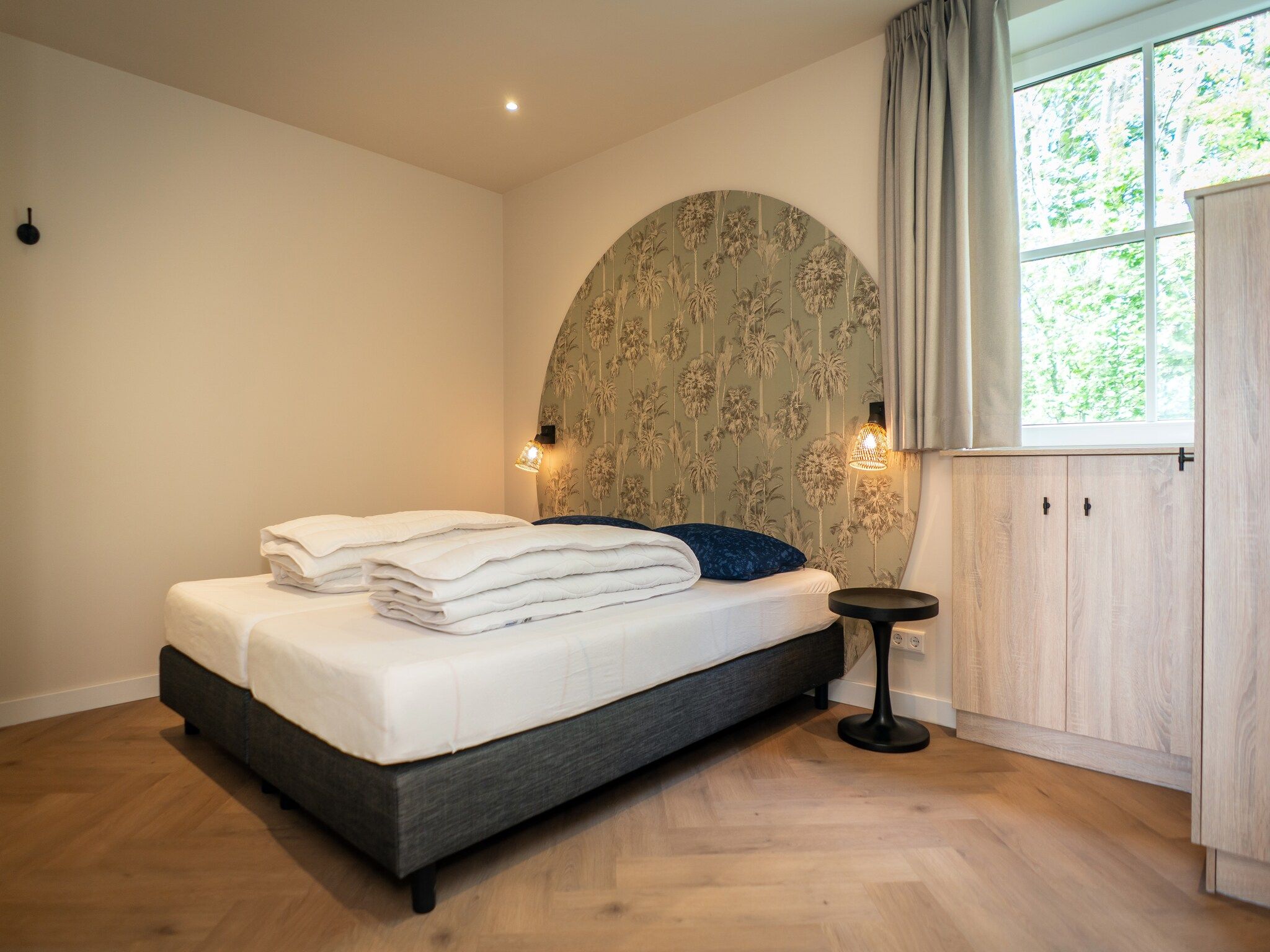 Een slaapkamer van So What 33A in De Koog