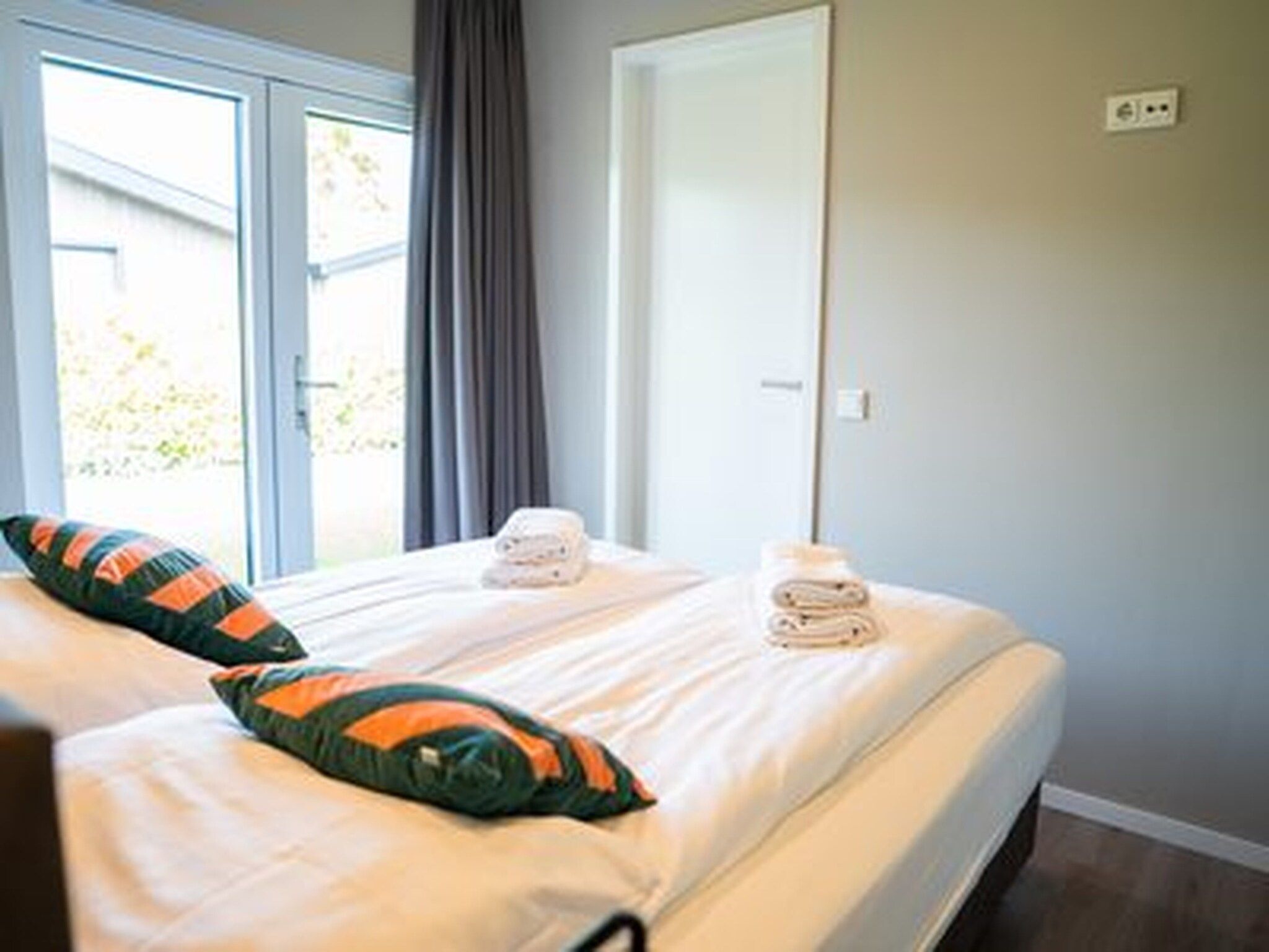 Een slaapkamer van Vakantiepark Molenvelden 11 in Veldhoven